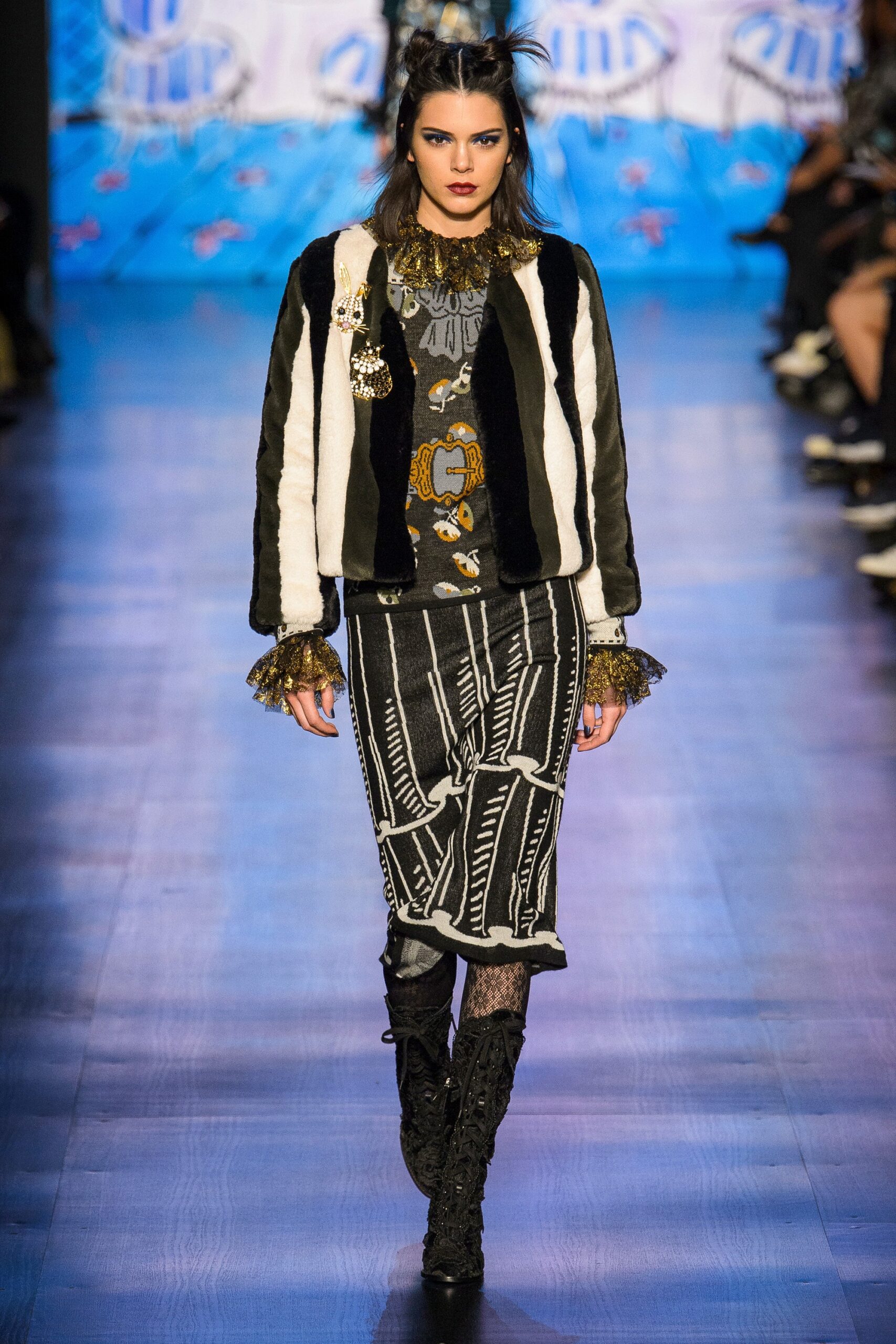 black and white faux-fur jacket with printed dress