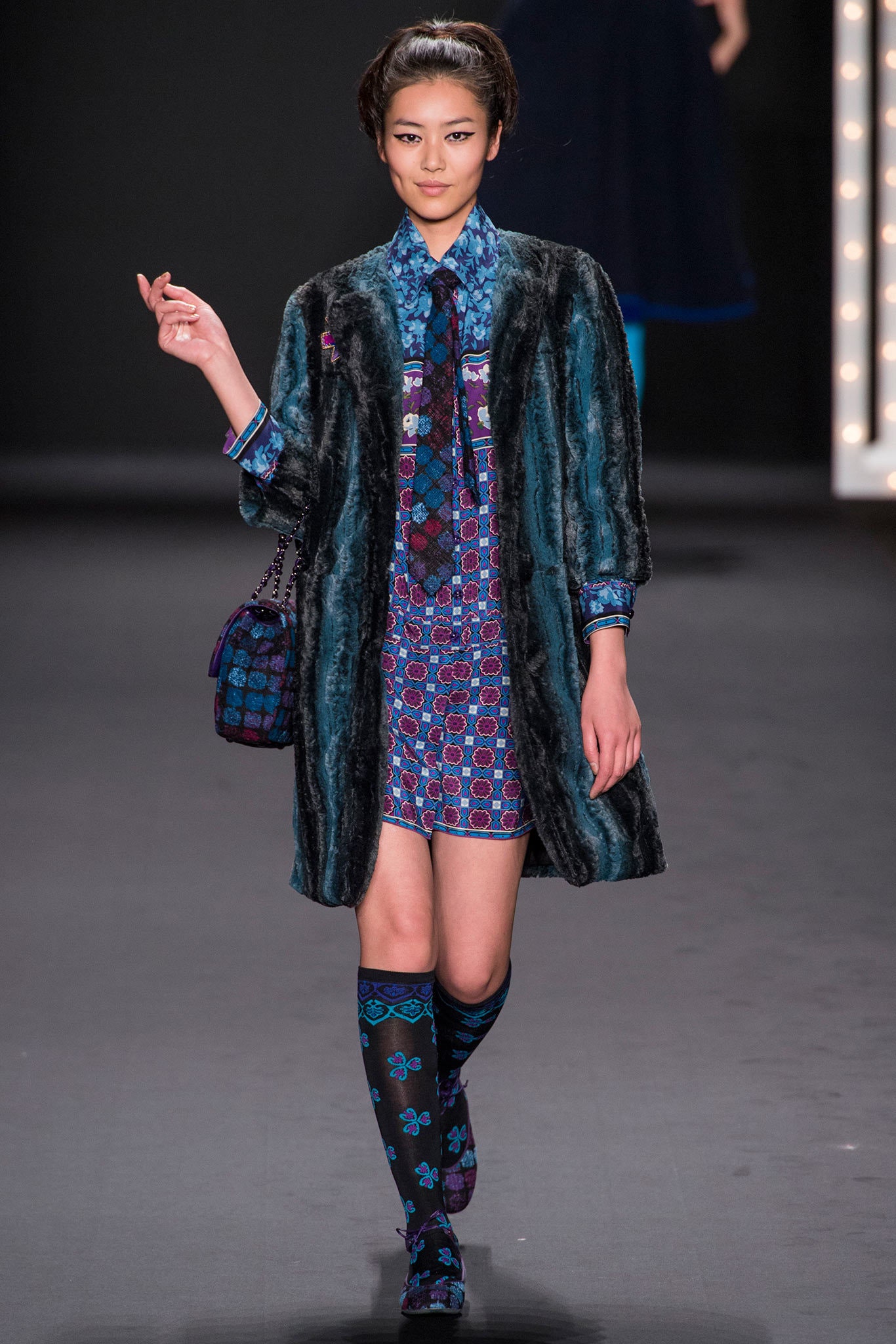black fur coat with mini dress
