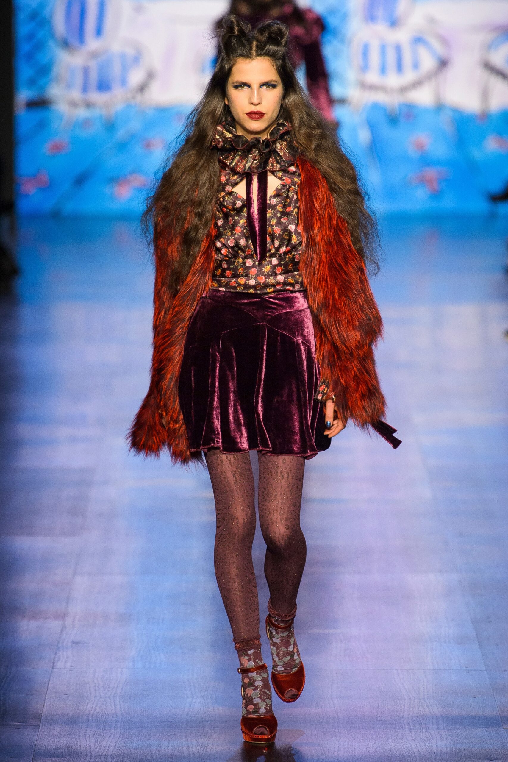 purple velvet mini dress with red fur coat