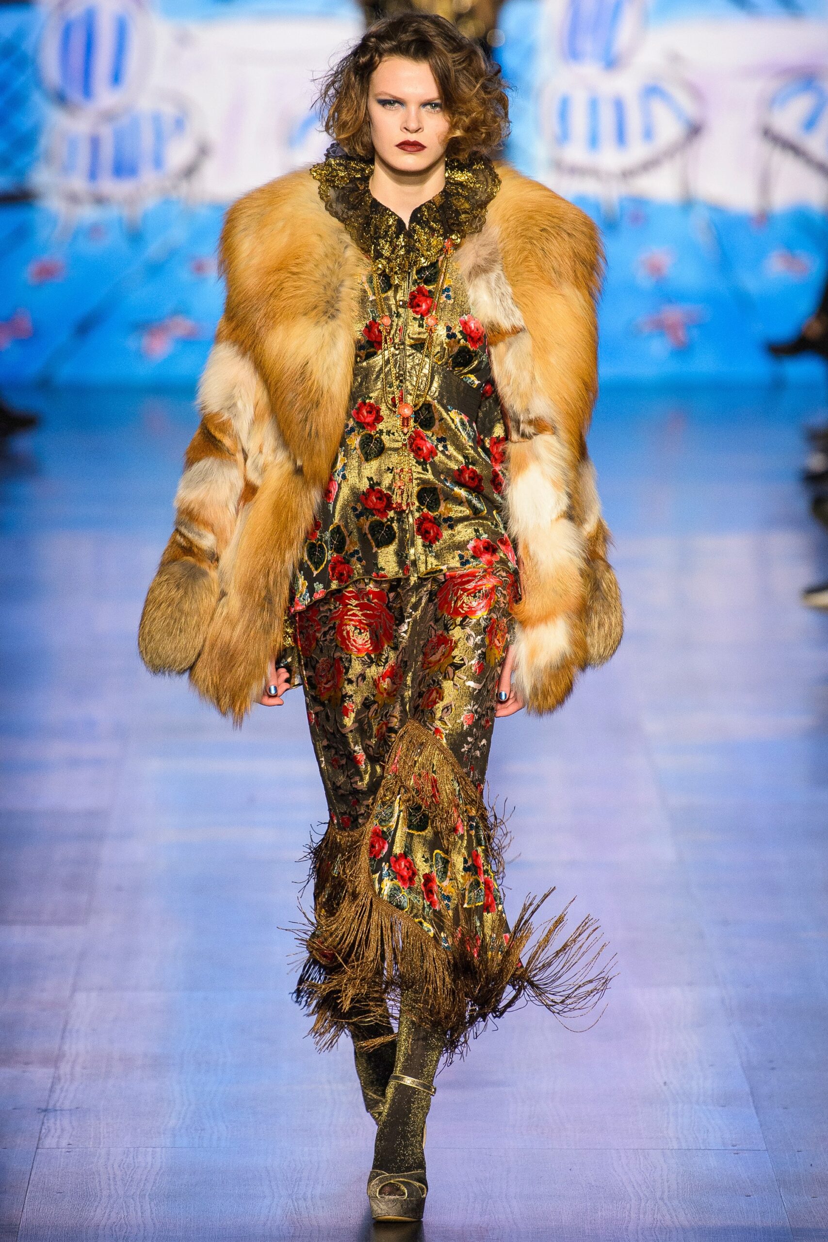brown fur oversized coat and black silk jumpsuit