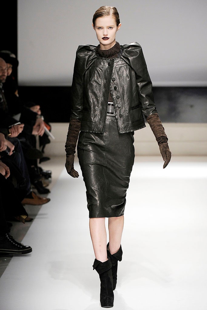 black leather fitted jacket and skirt