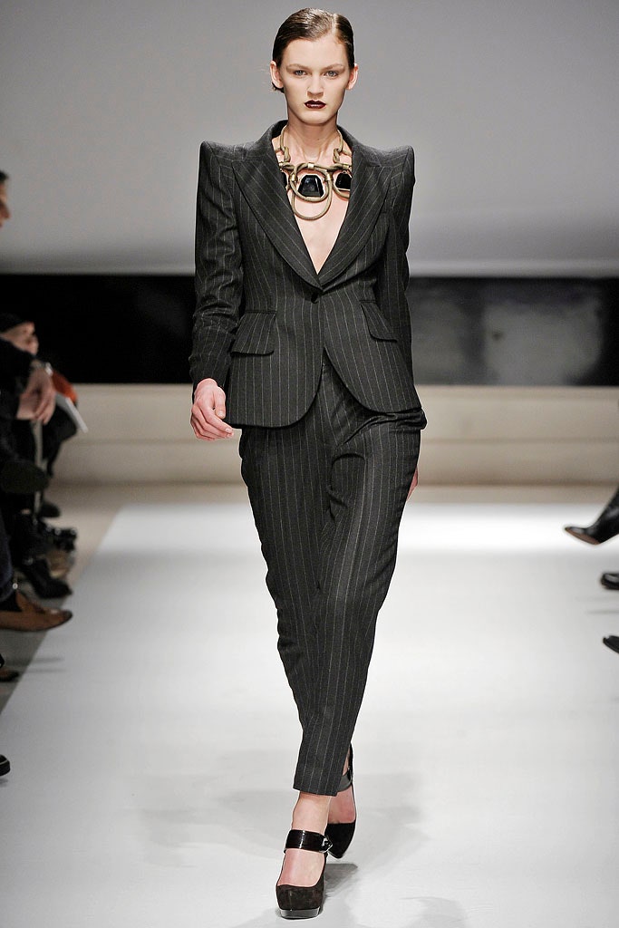 black tailored suit with platform shoes