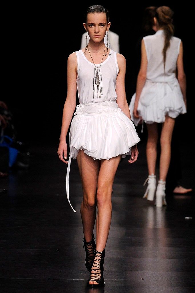 white fitted top and mini skirt