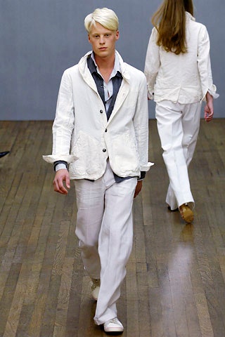 white fitted jacket and relaxed pants