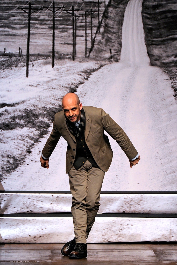 gray tailored suit with black shirt