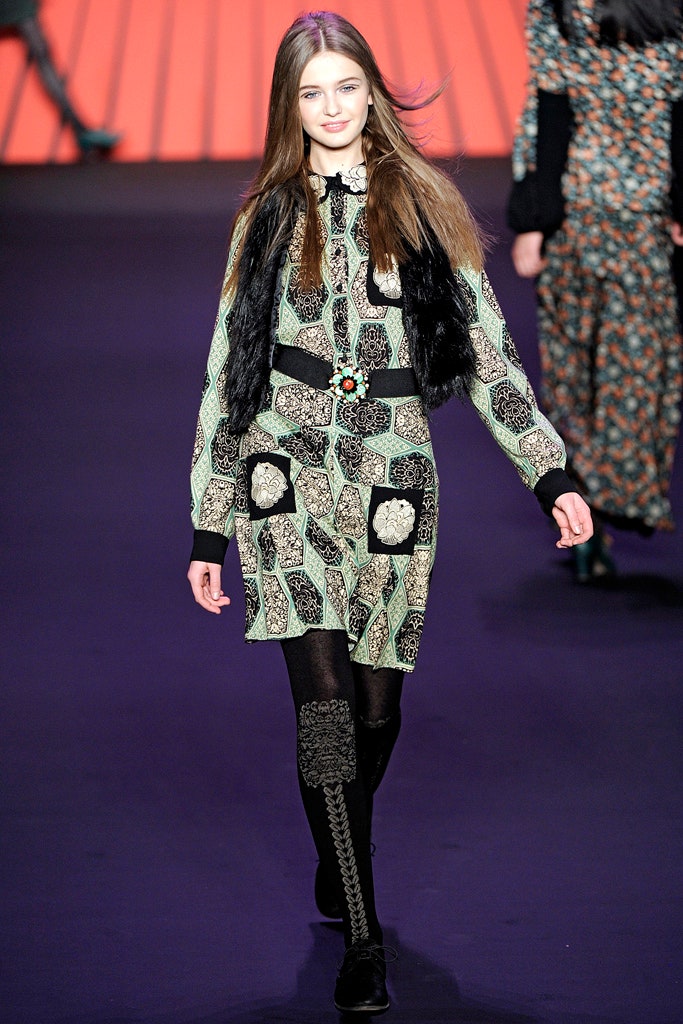green printed shirt-dress with black fur vest