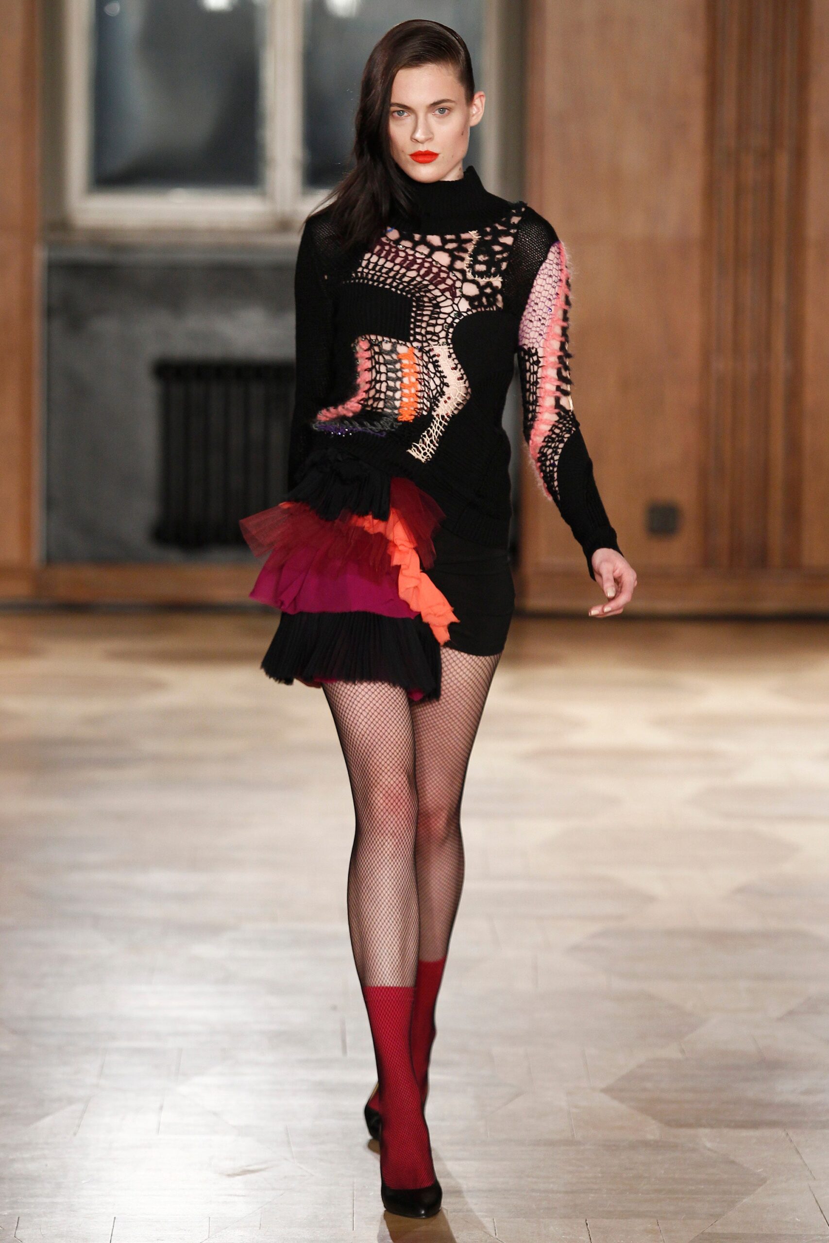 fitted black top with asymmetric skirt