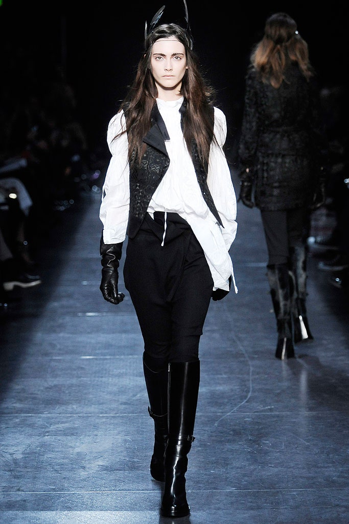 black leather vest with white blouse