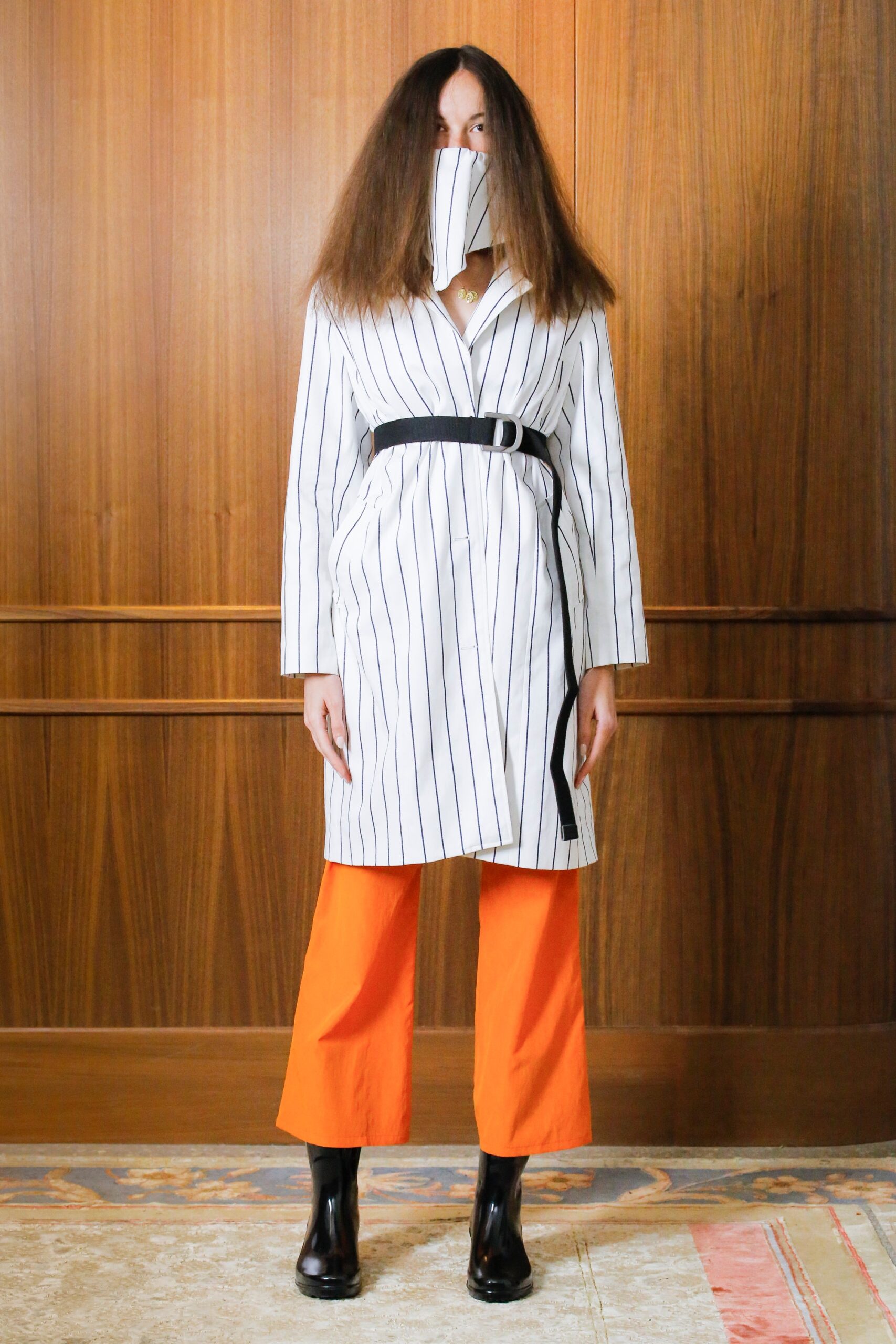 striped trench coat with orange pants