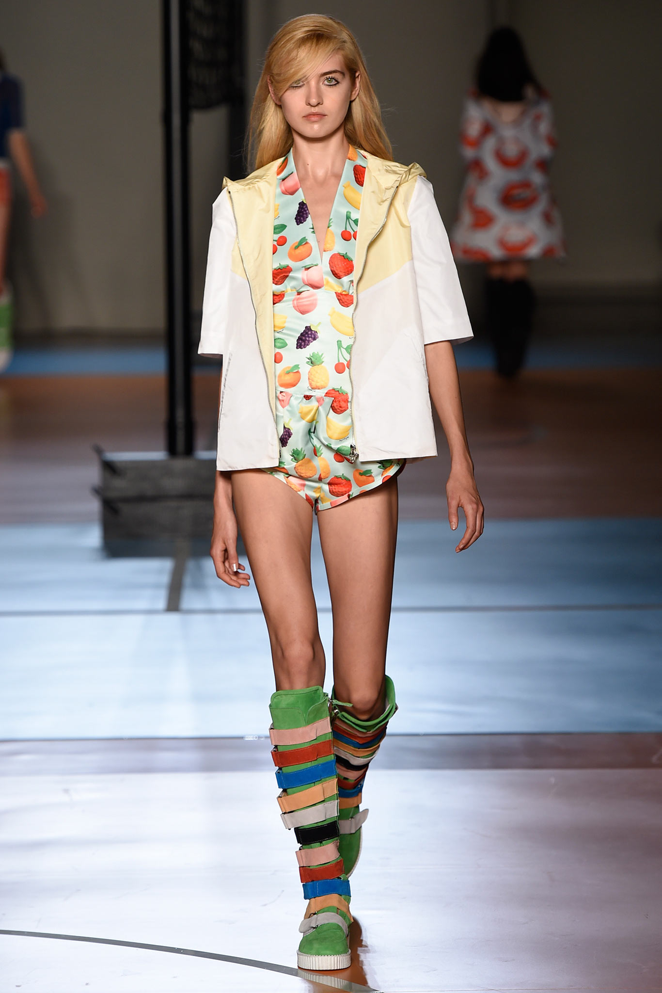 multi-colored romper with white jacket