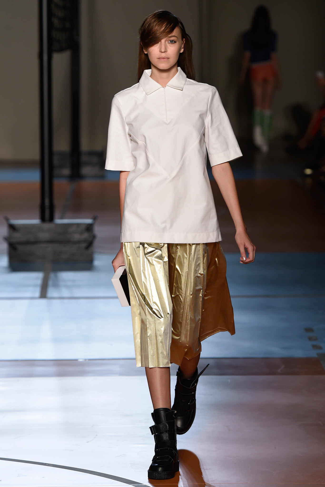 white fitted shirt and gold skirt
