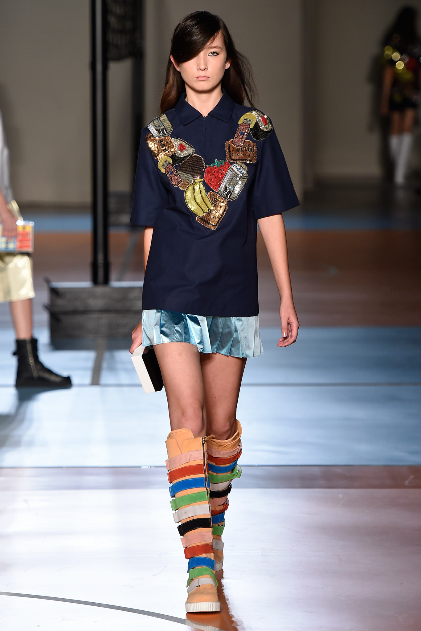 blue embroidered top with metallic mini skirt