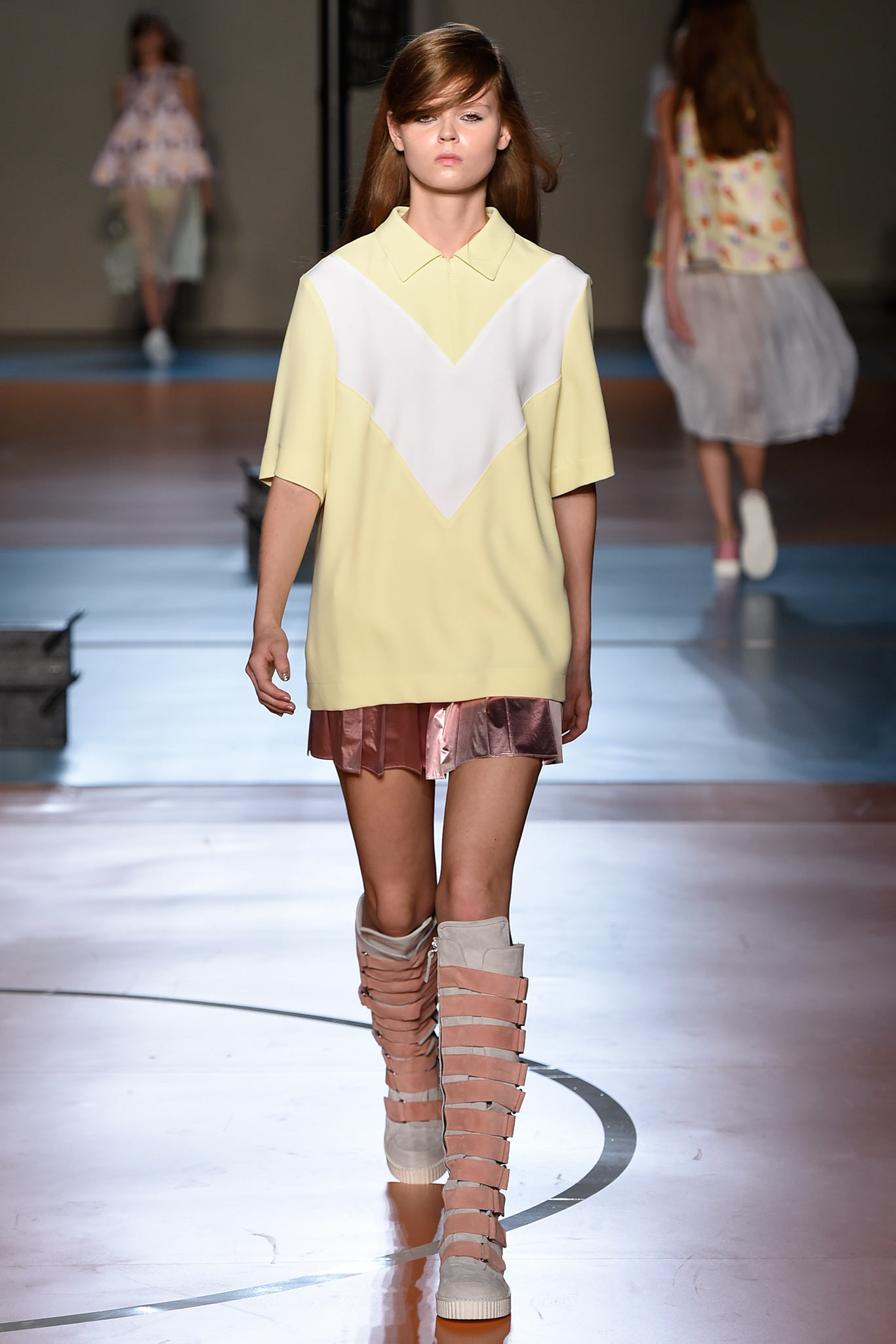 yellow color-blocked top with pink skirt
