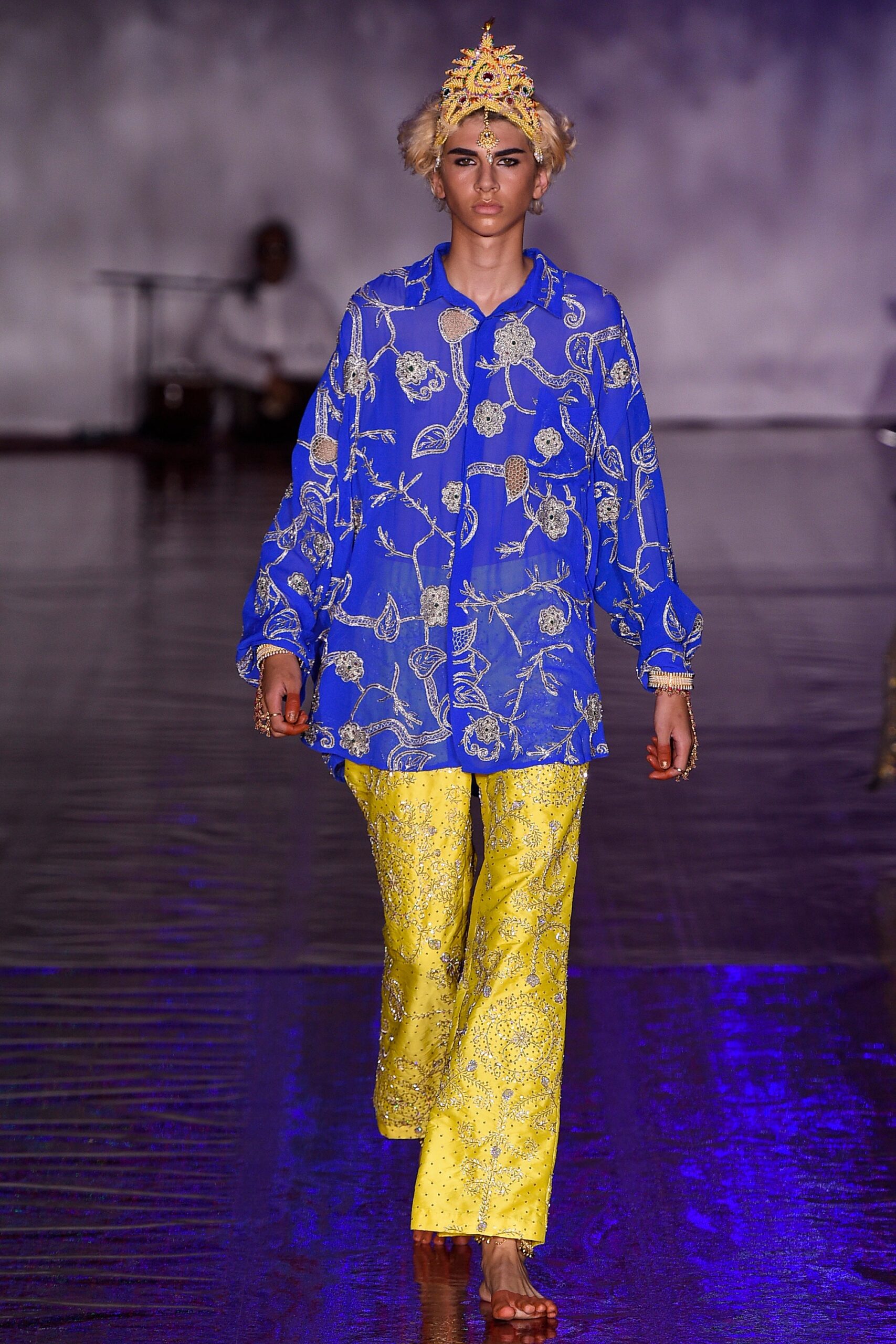 blue embroidered silk shirt and yellow embellished pants