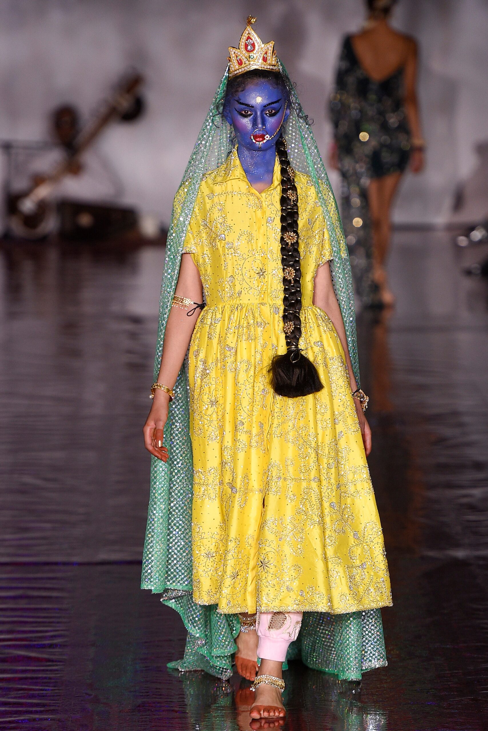 yellow embroidered midi dress with green cape