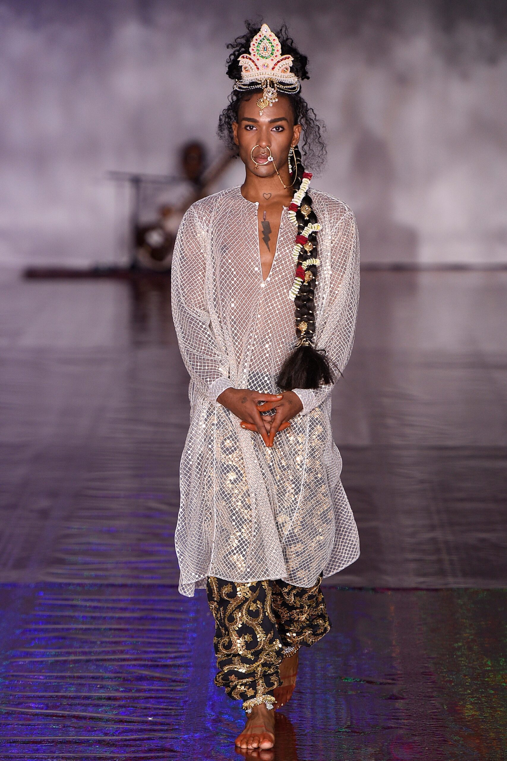 sheer white top with flared pants