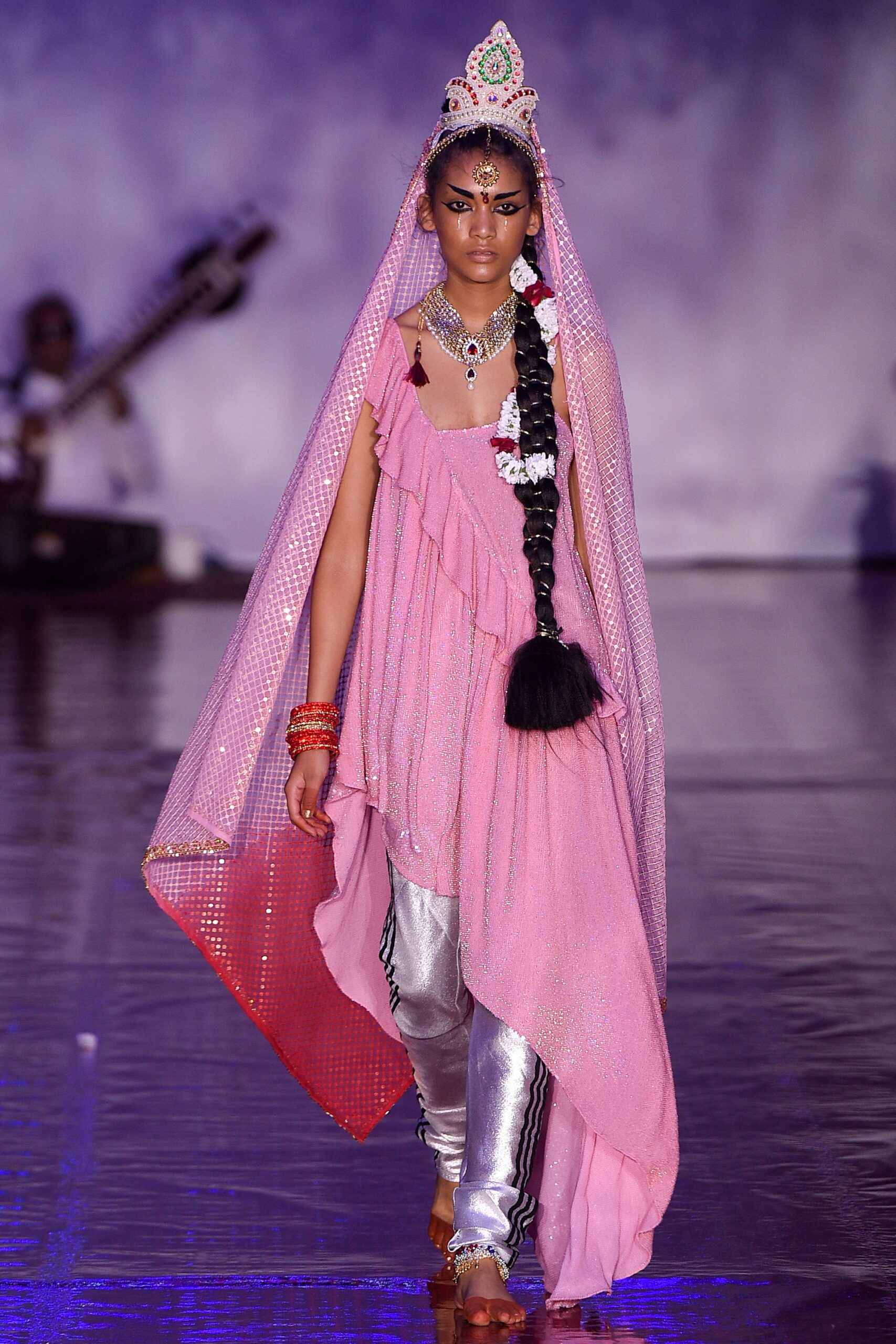 pink layered dress with silver pants