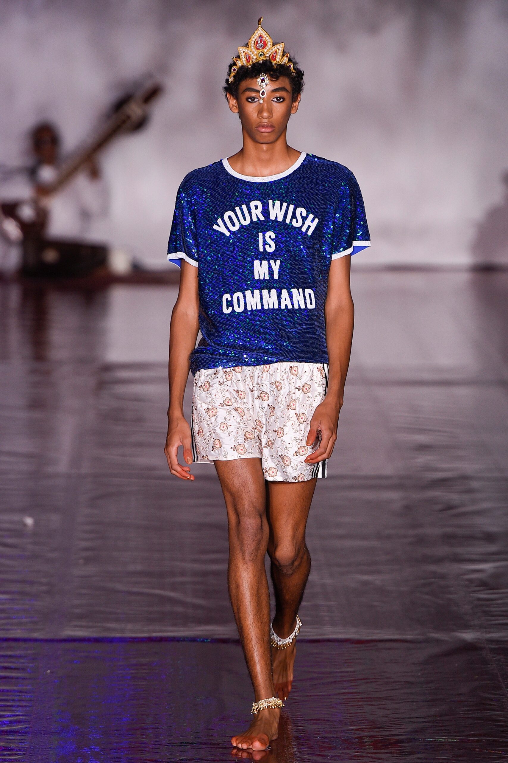 blue sequin t-shirt with floral shorts