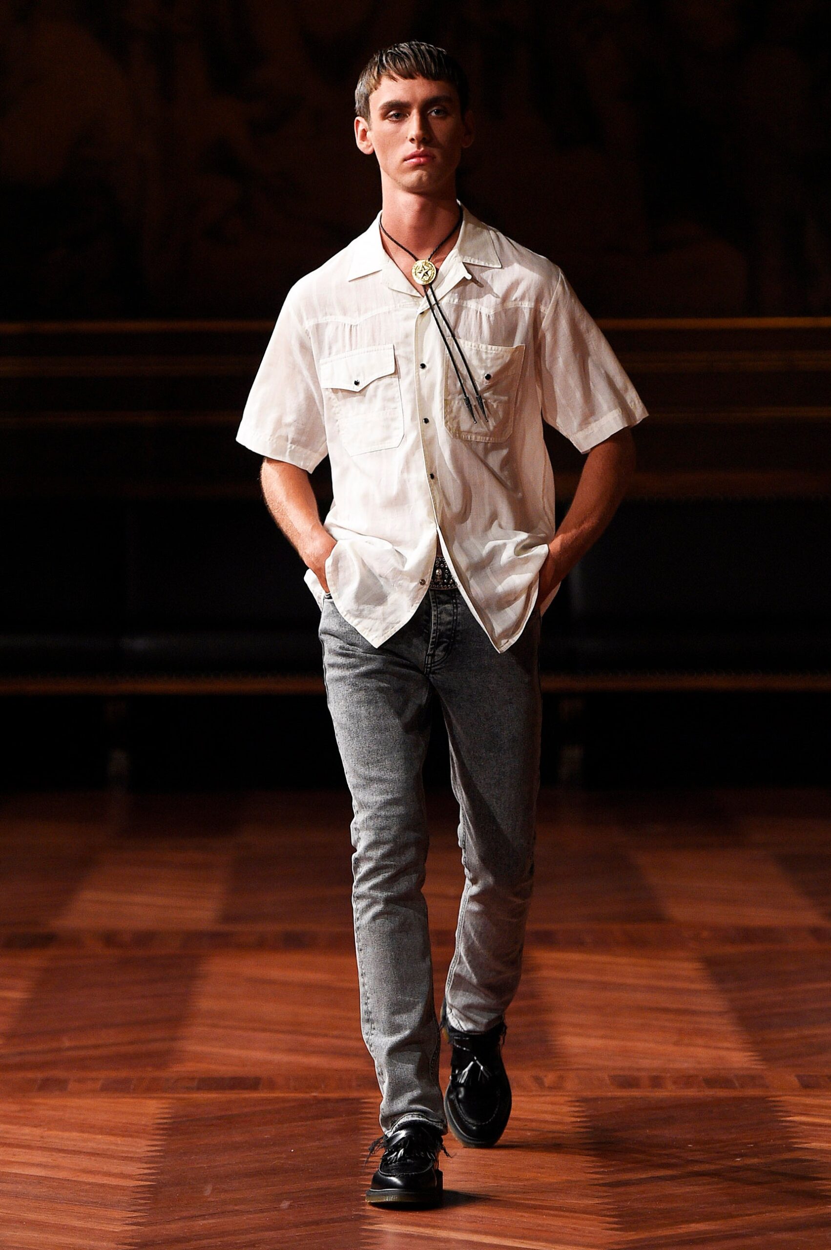 white relaxed shirt with gray jeans