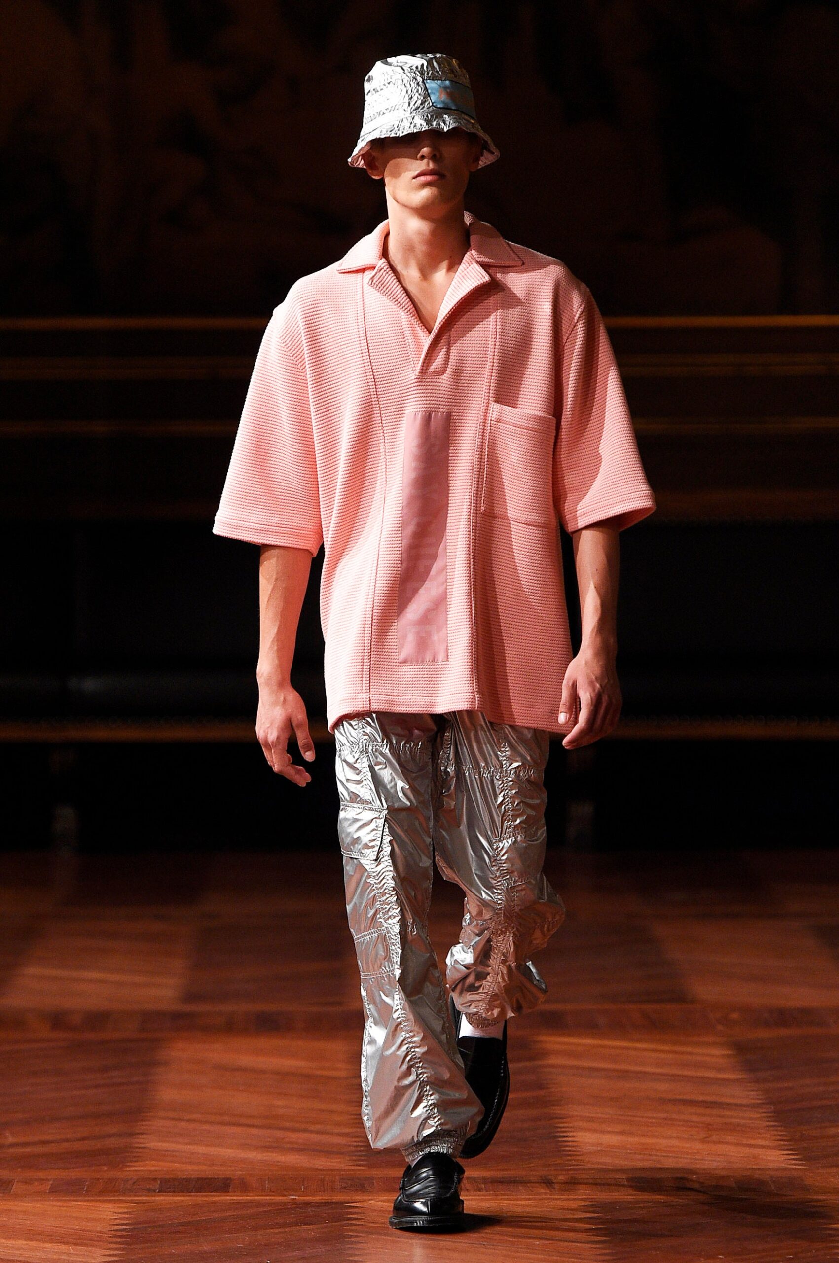 pink relaxed top with silver pants