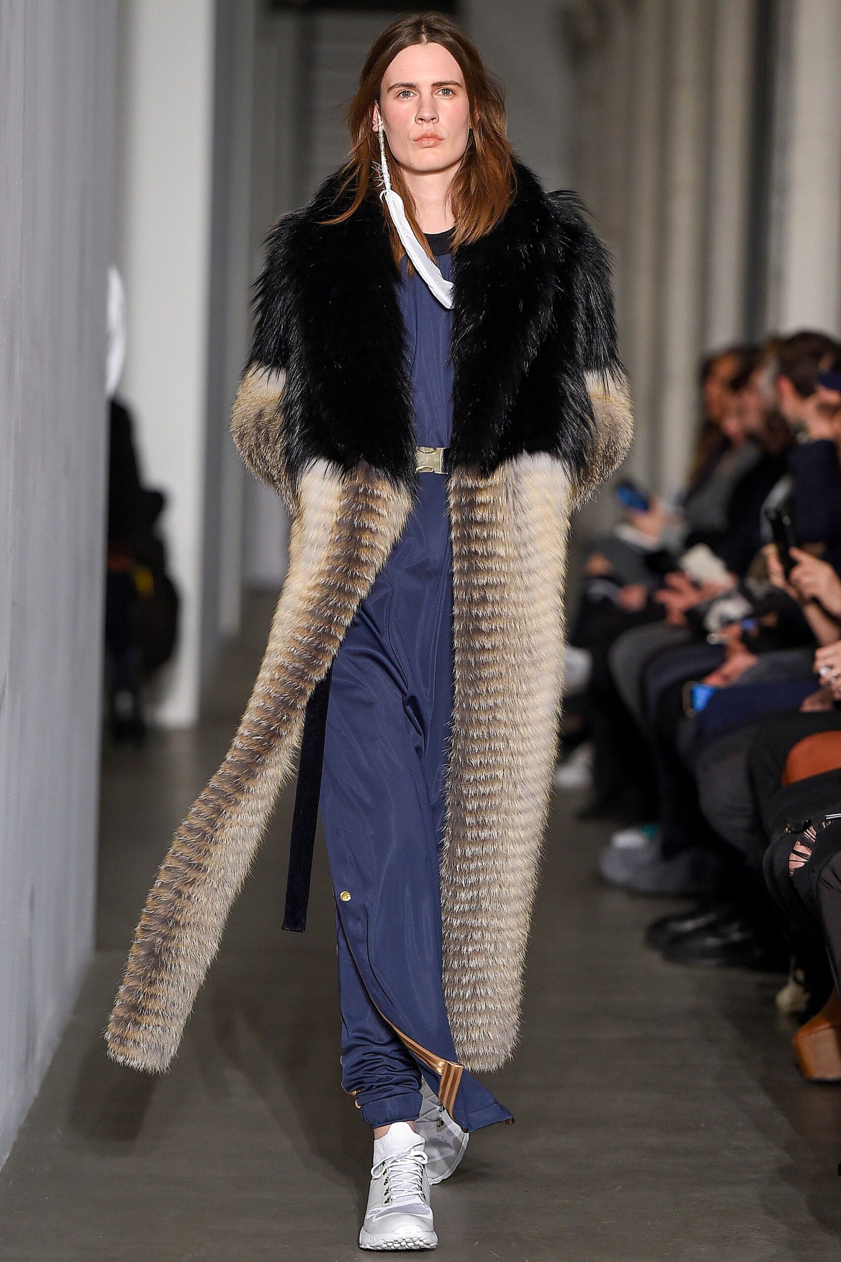 black fur coat with blue jumpsuit