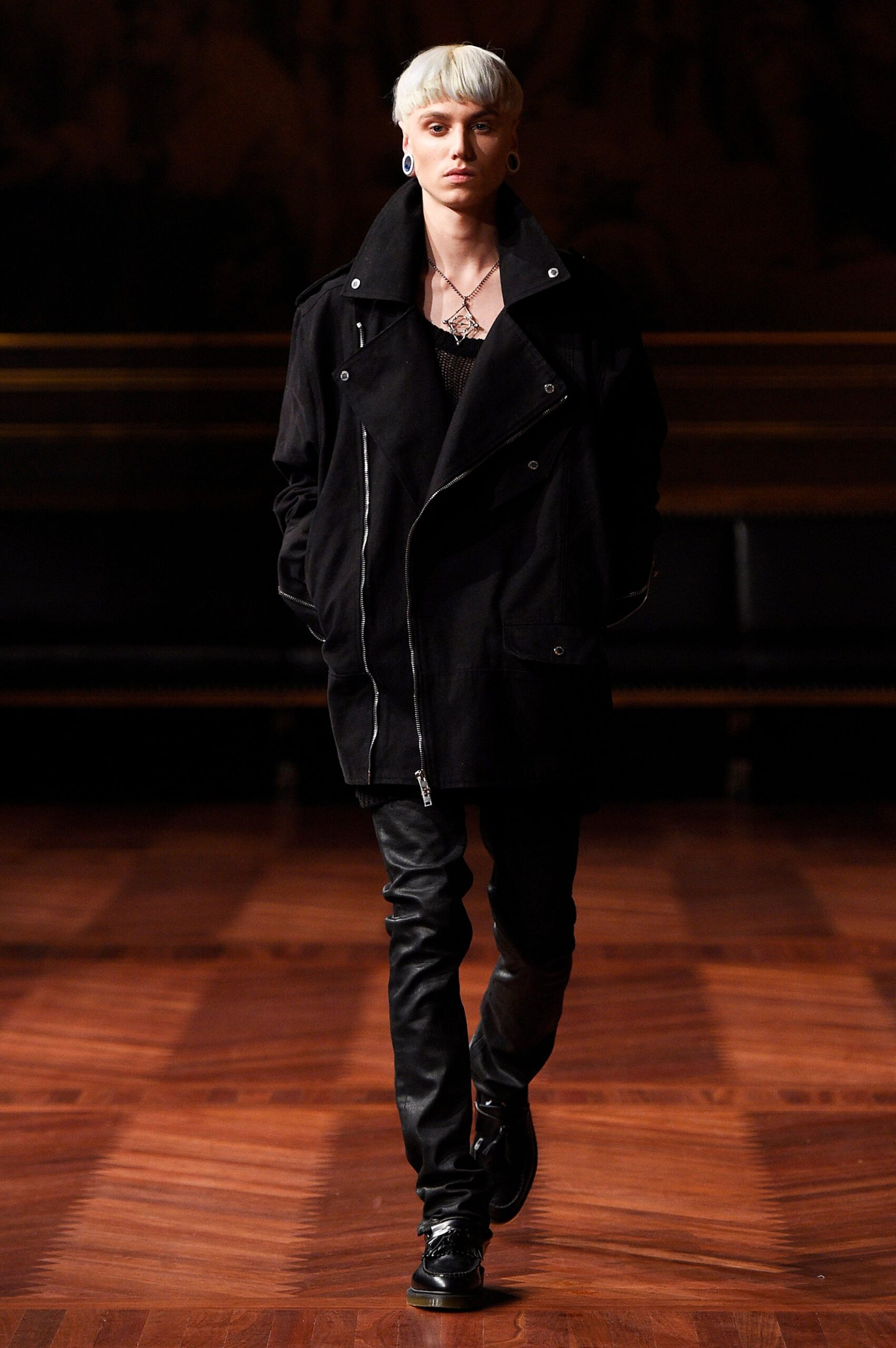 black coat and leather pants