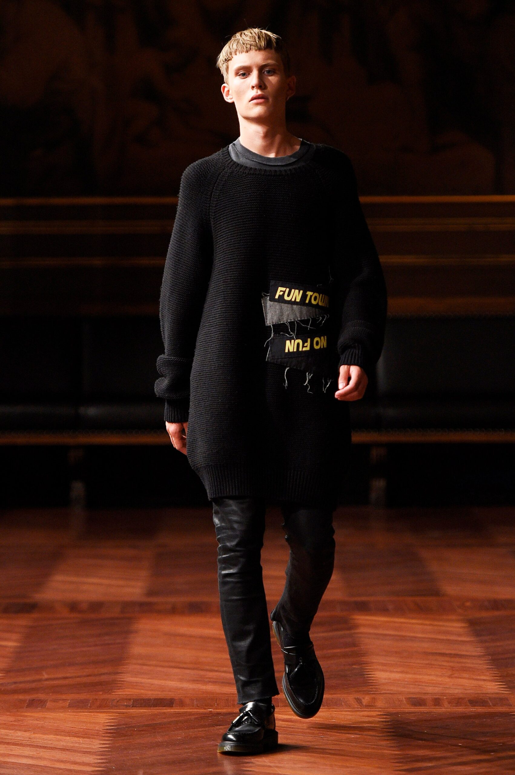 black oversized sweater with printed detail