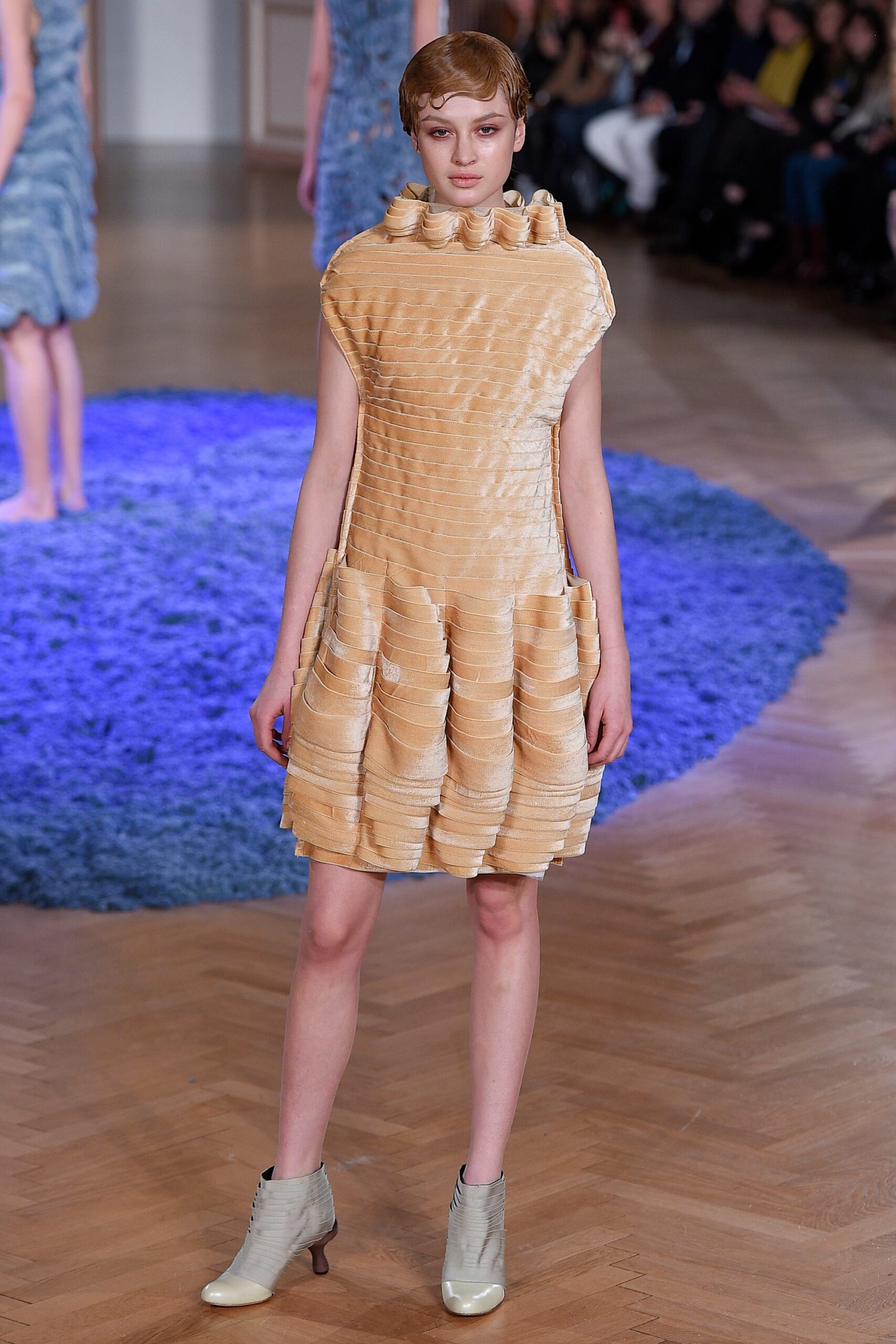 beige silk sleeveless high-neck fitted pleated mini dress