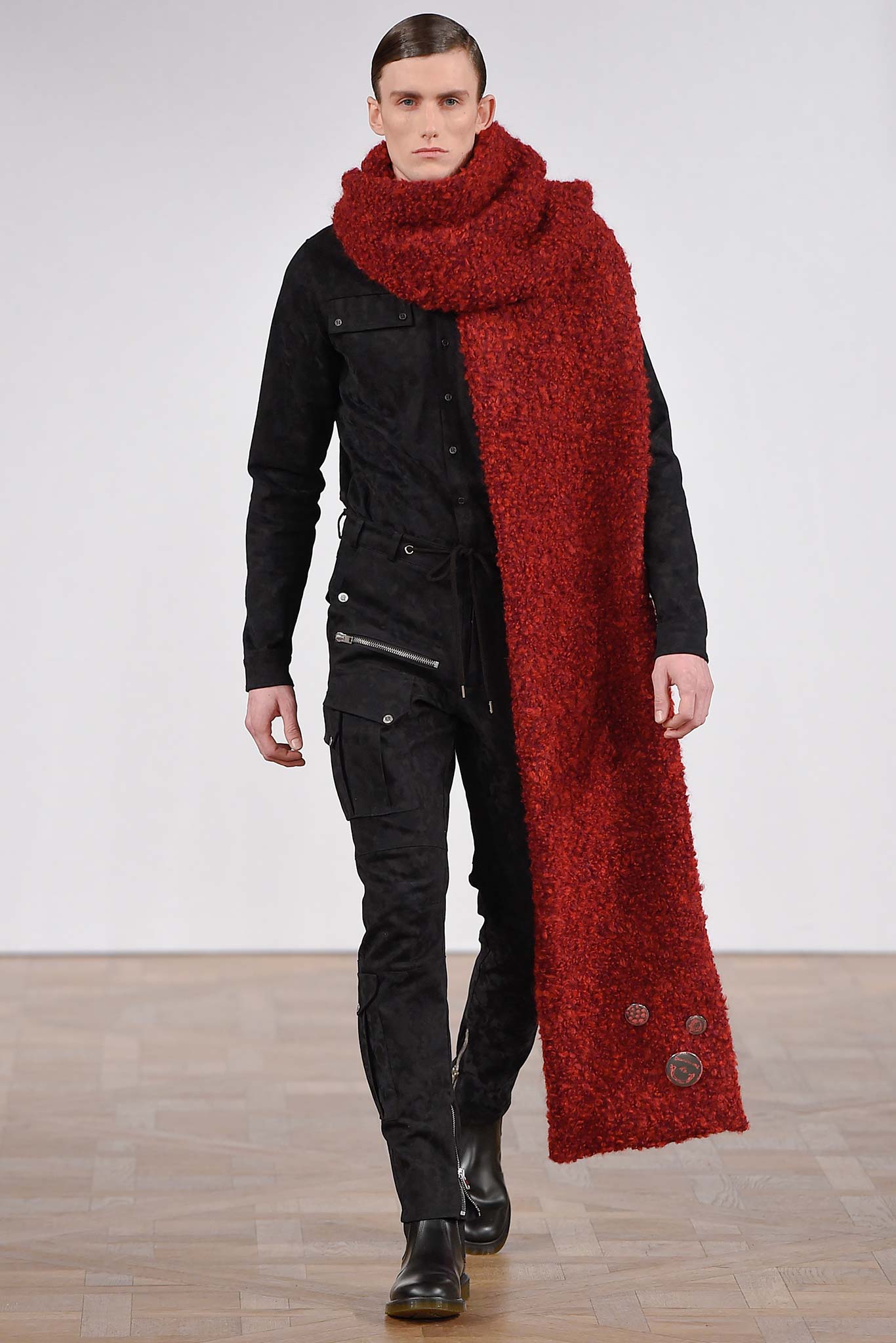 black suede jacket with red scarf