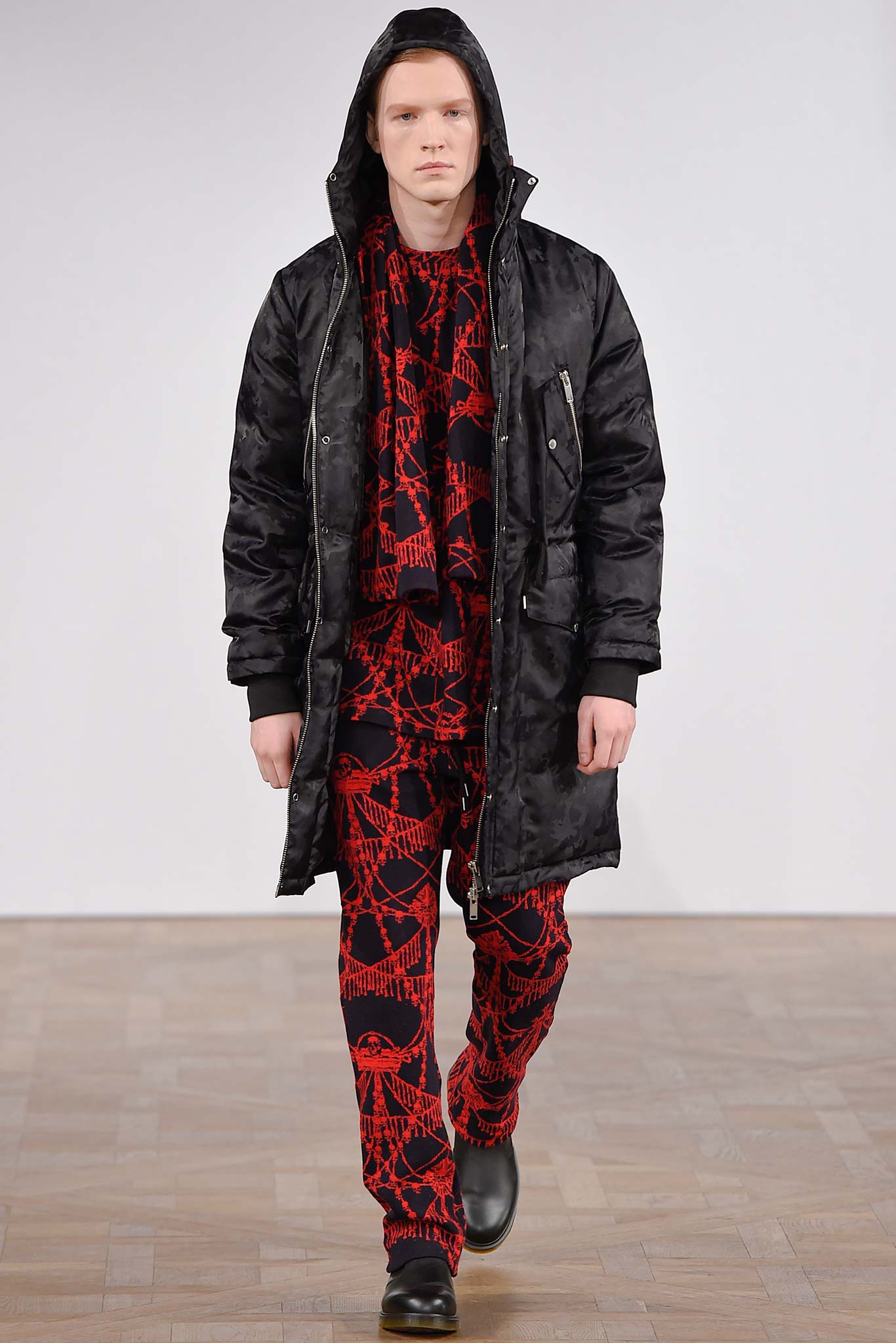 black coat with red printed pants