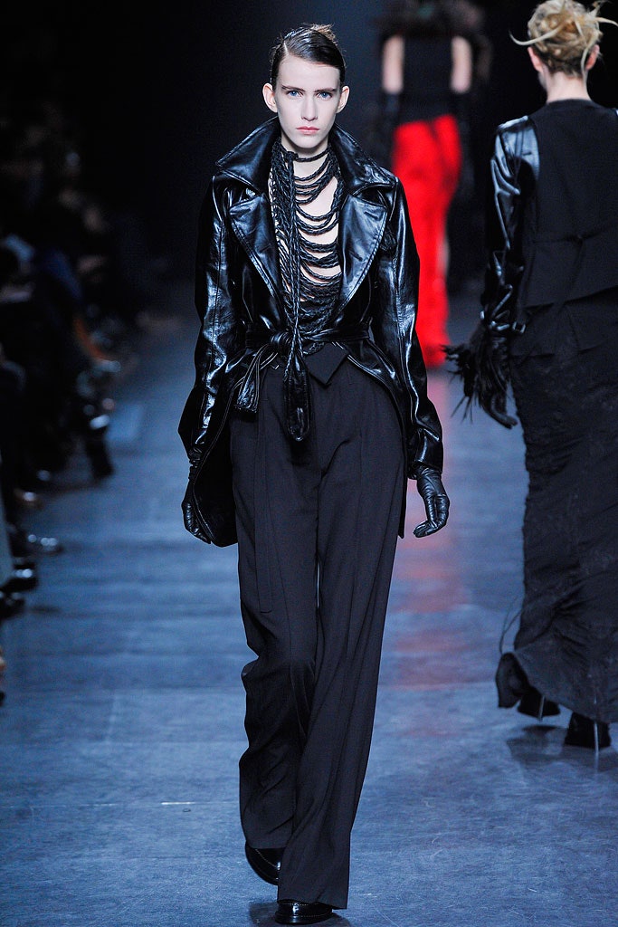 black leather fitted jacket and relaxed pants