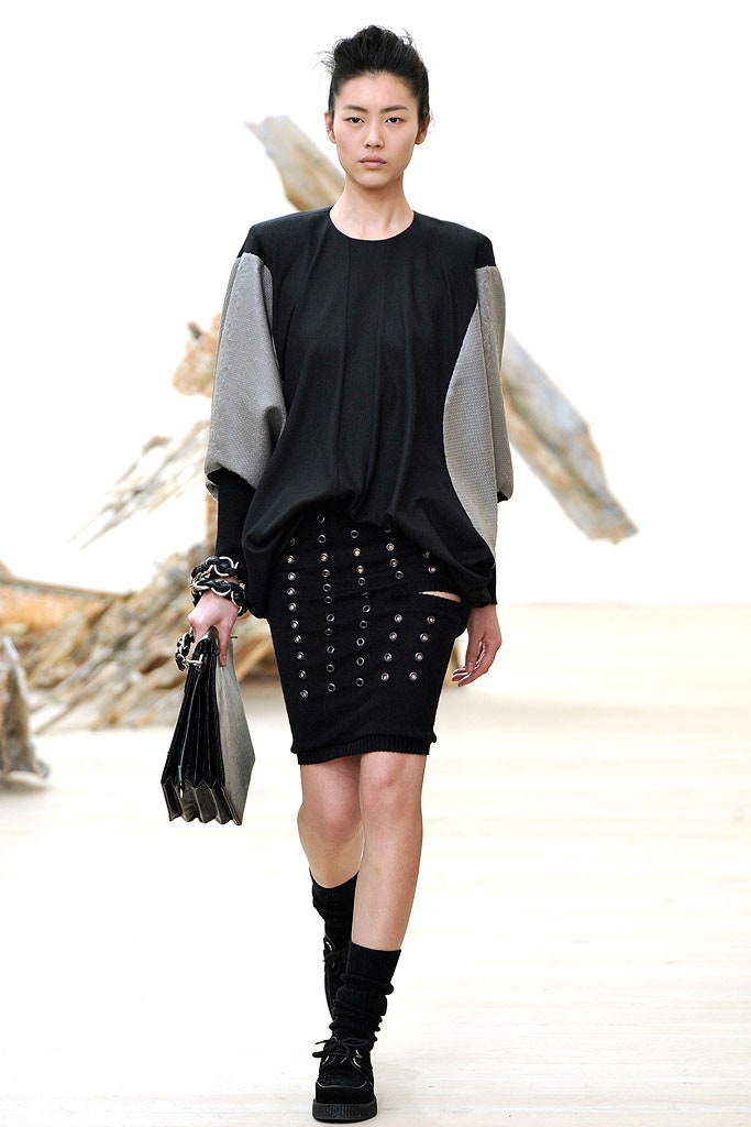 black relaxed top and fitted skirt