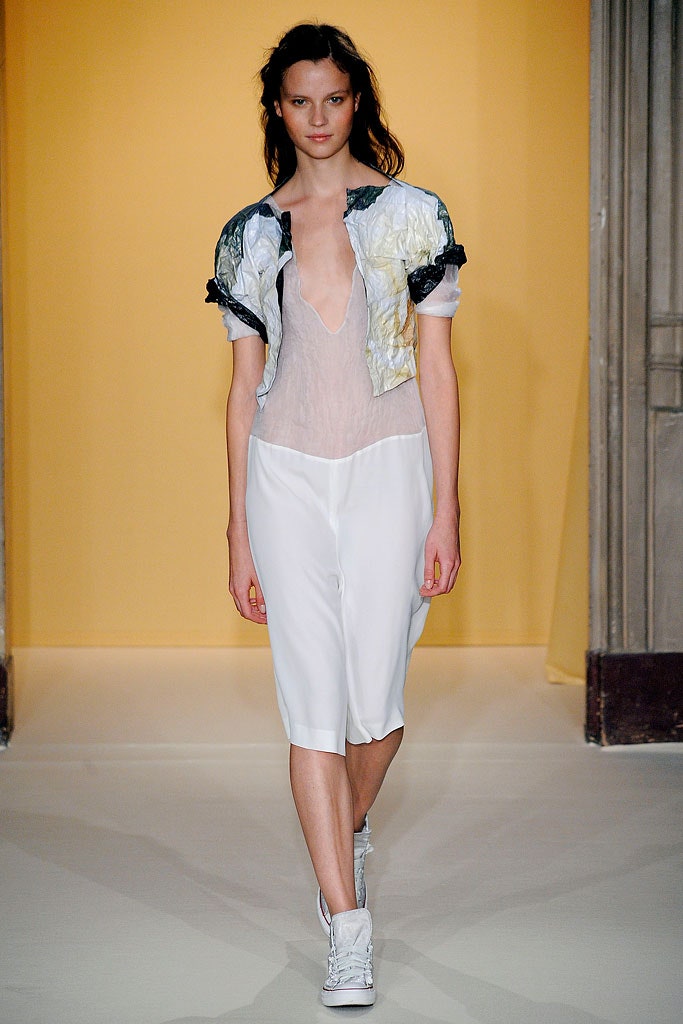 white draped top with relaxed pants