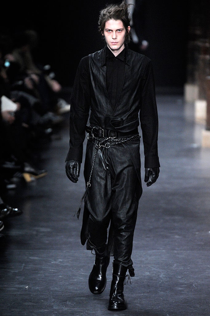 black leather vest and pants