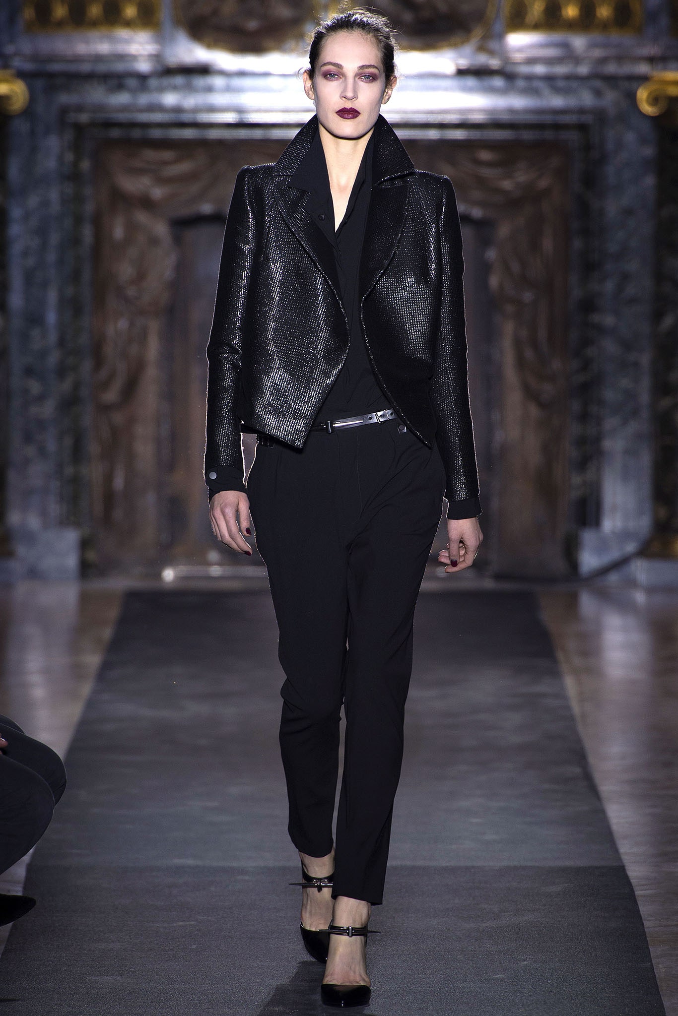 black leather fitted jacket and tailored pants