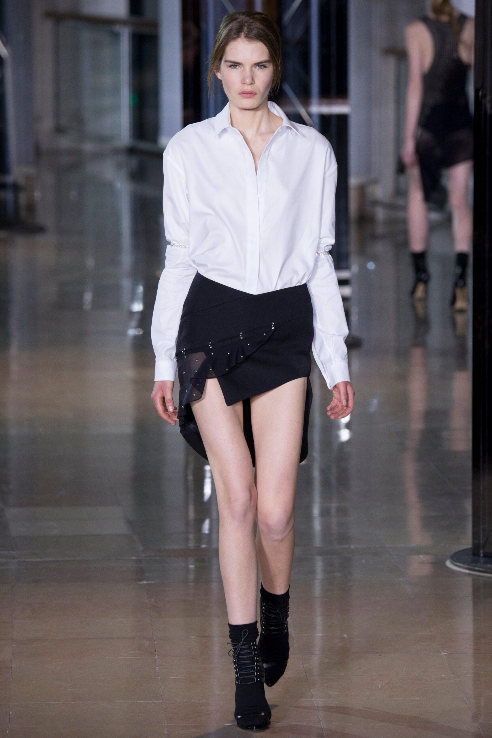 white fitted shirt and black asymmetric skirt