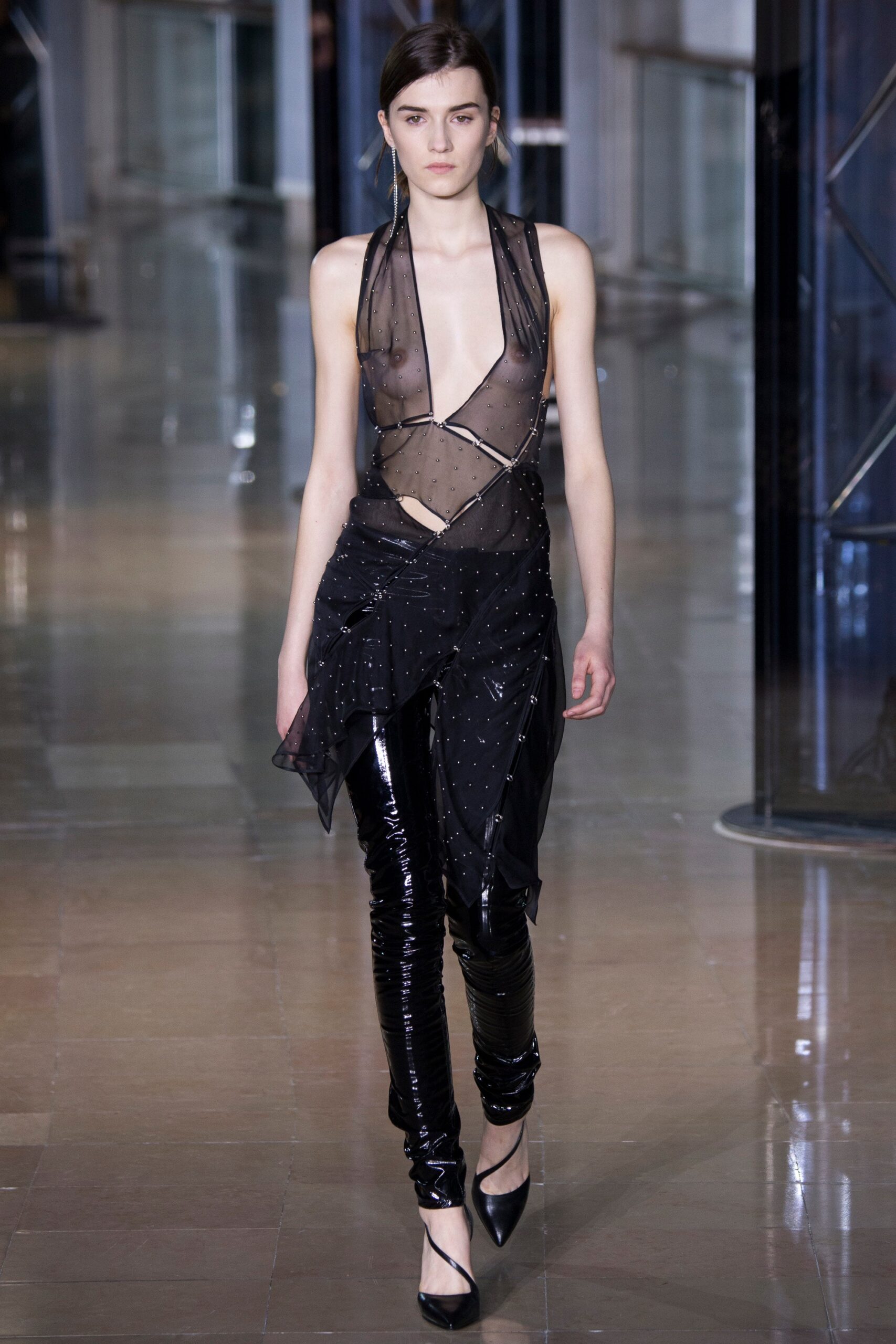 black sheer top and fitted pants