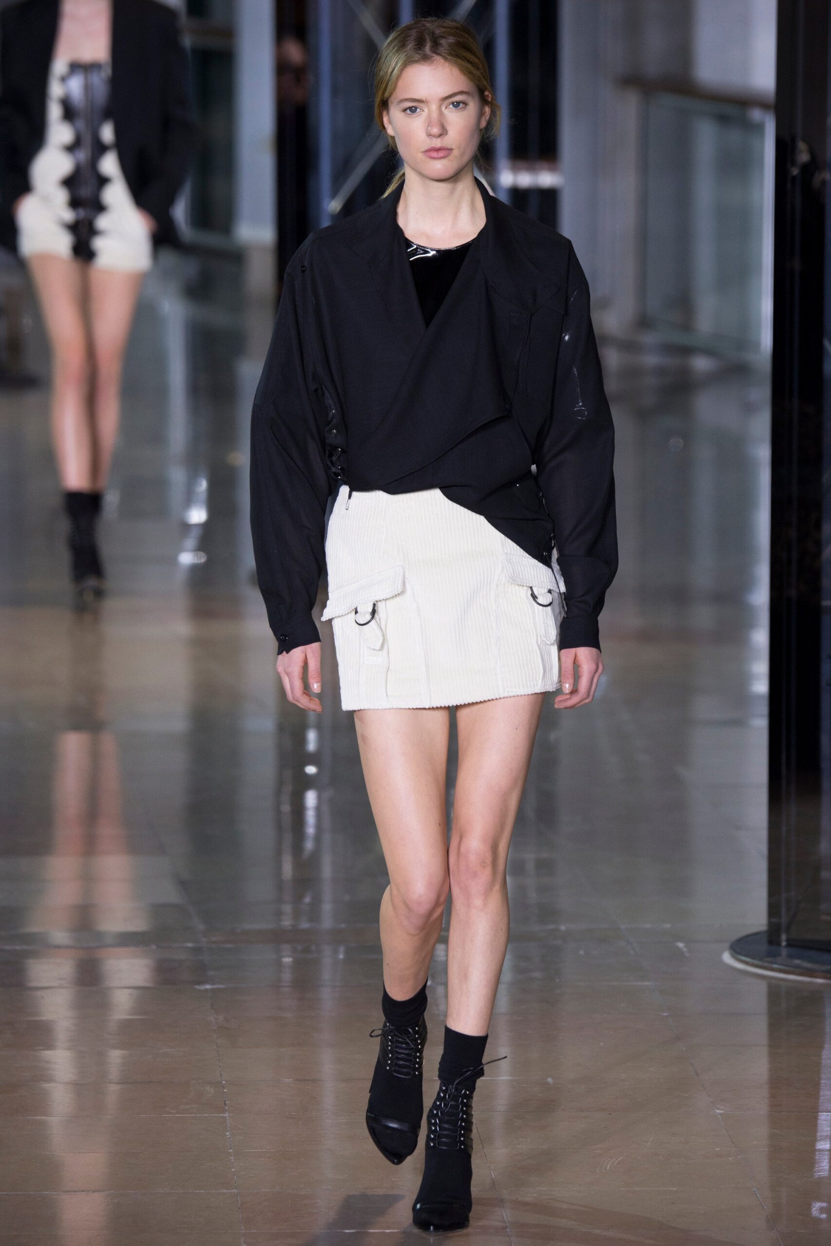 black relaxed top white mini skirt