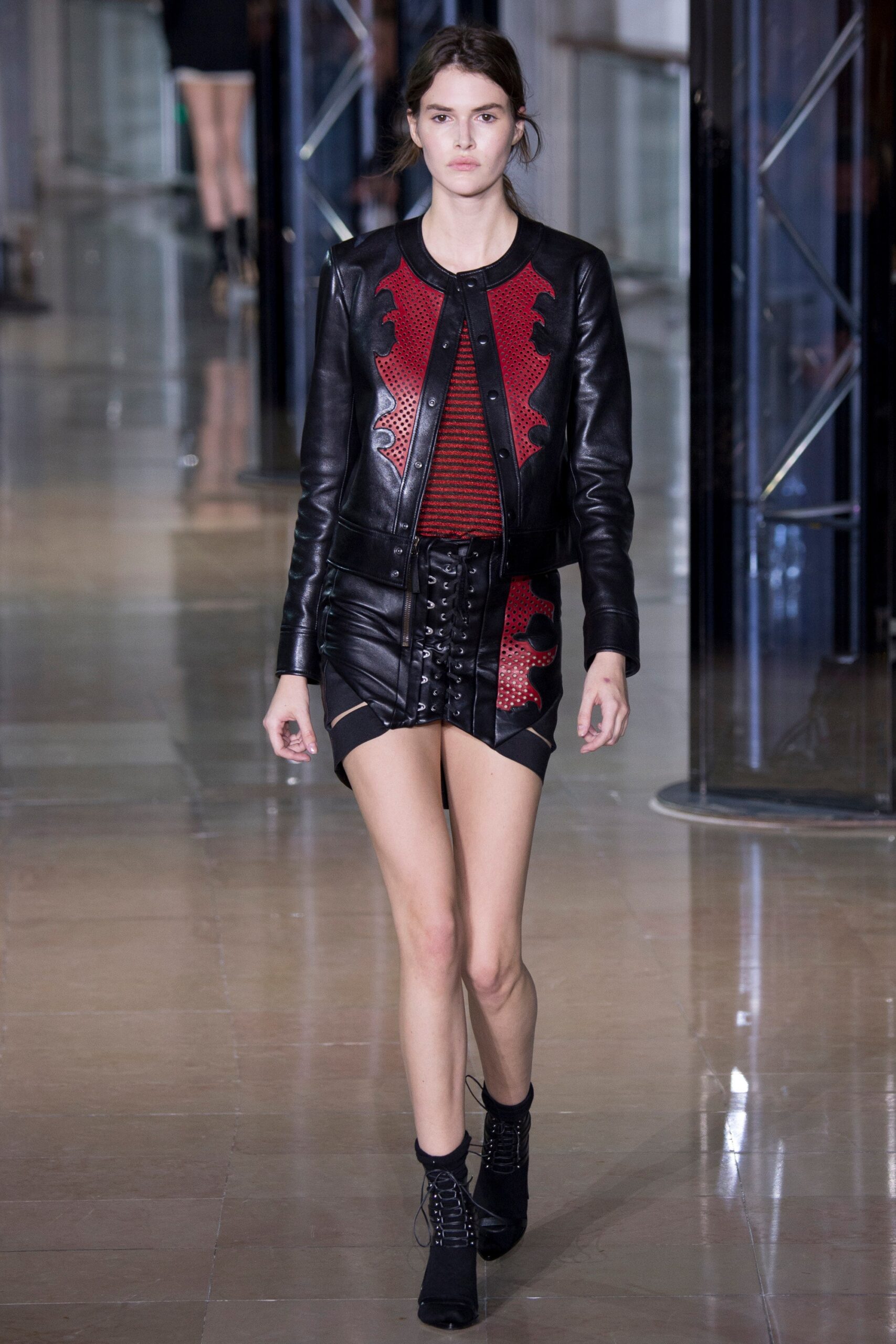 fitted black leather jacket and skirt