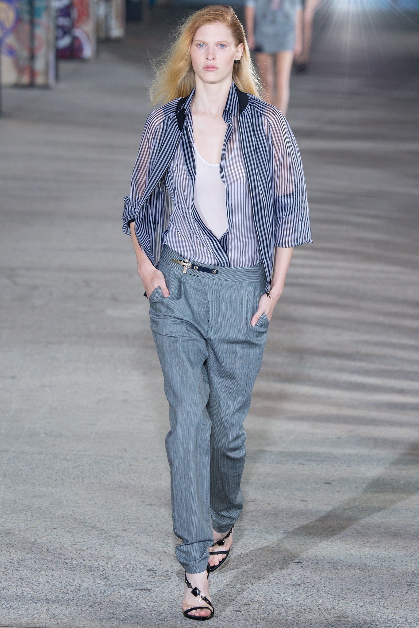 striped shirt and gray pants