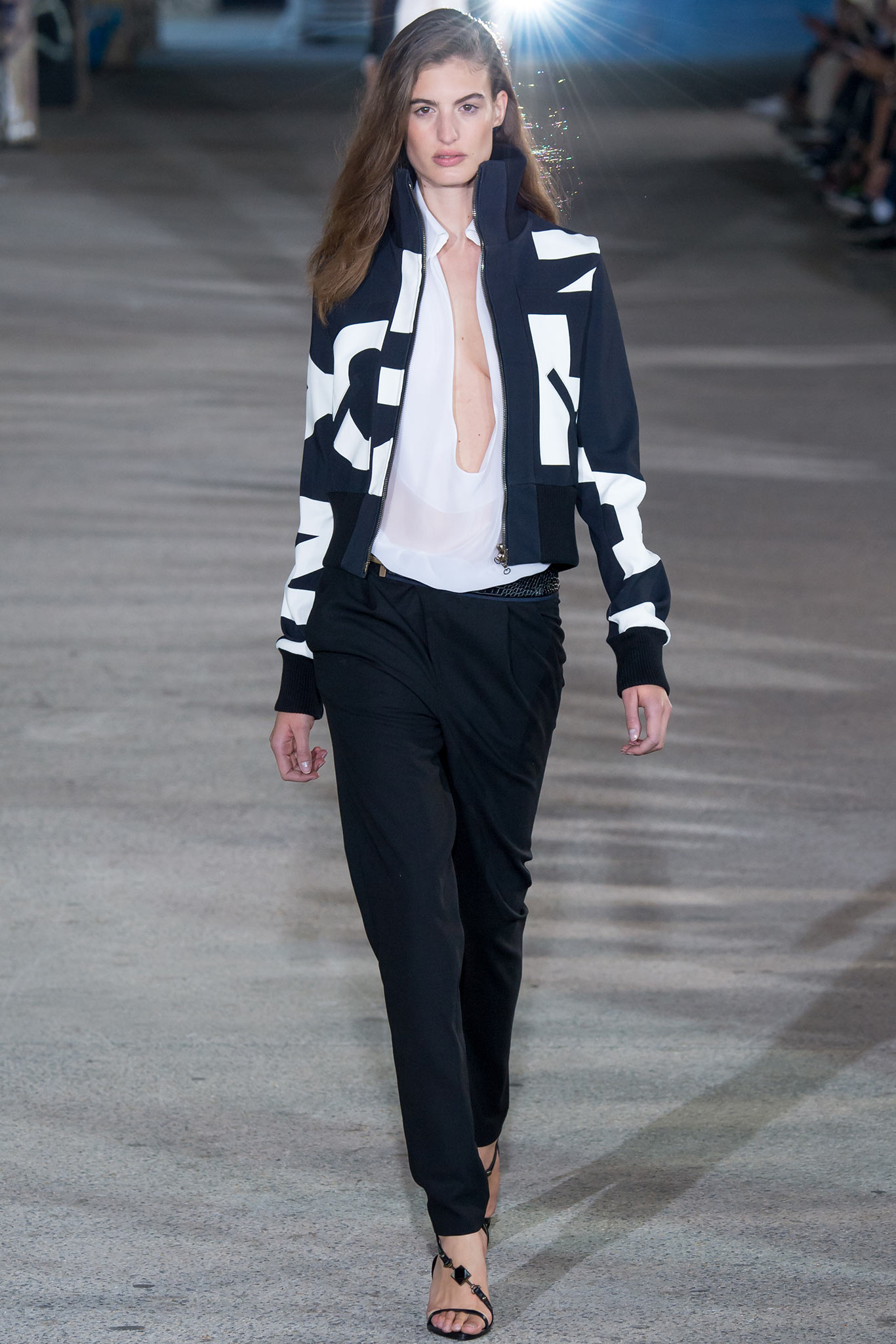 black and white fitted jacket with relaxed blouse