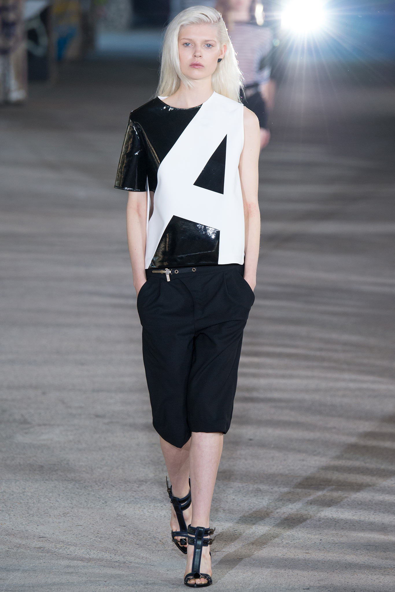 black and white asymmetric top with relaxed pants