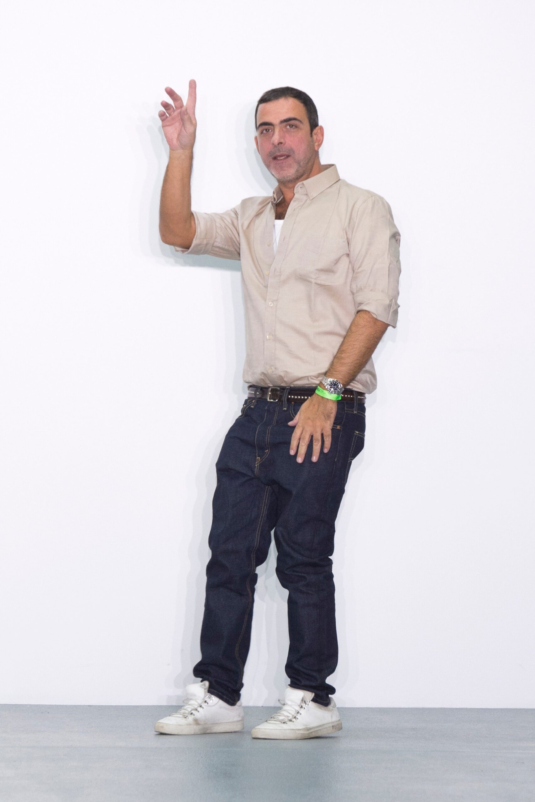 beige cotton shirt with blue jeans