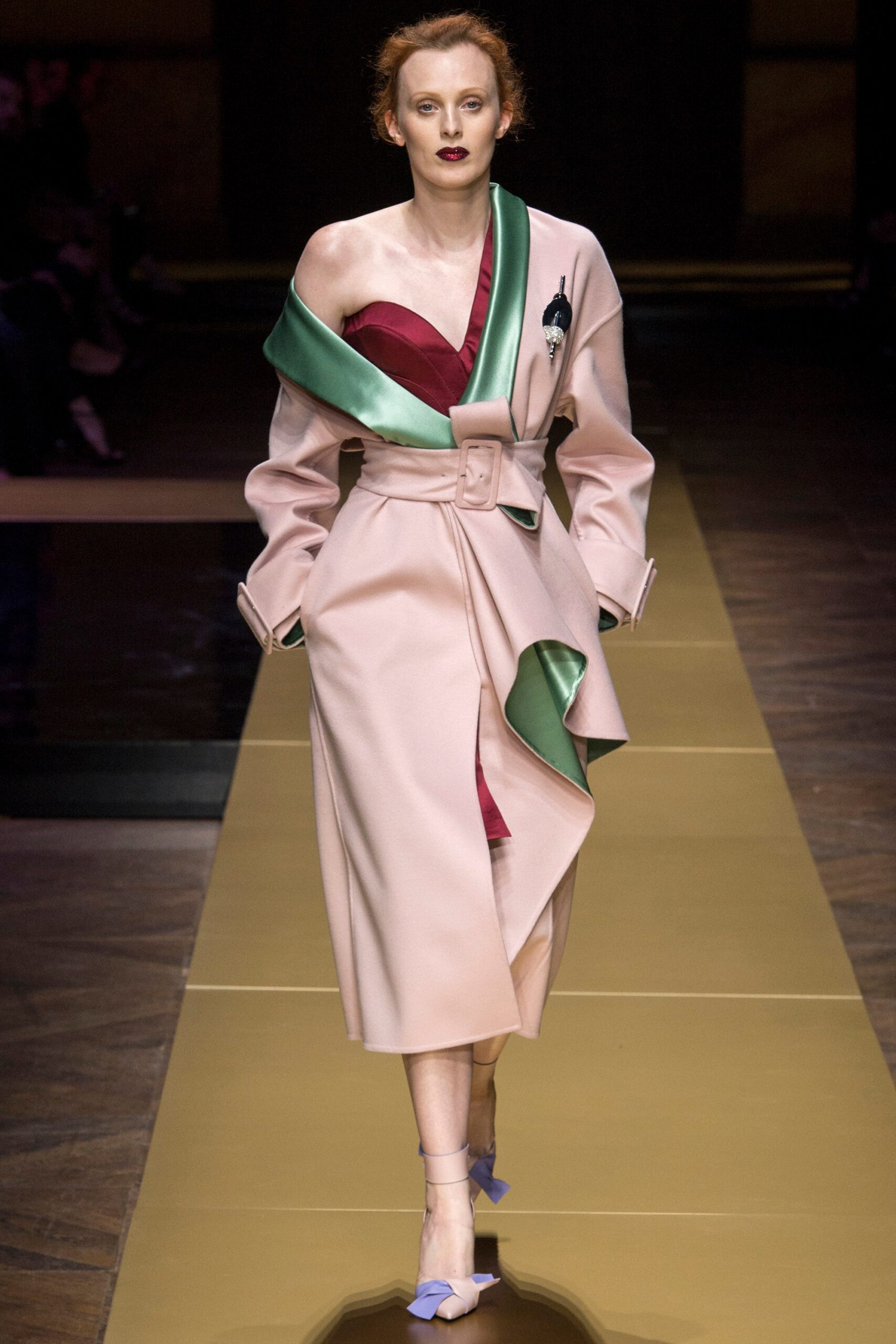 red silk sleeveless dress and beige coat
