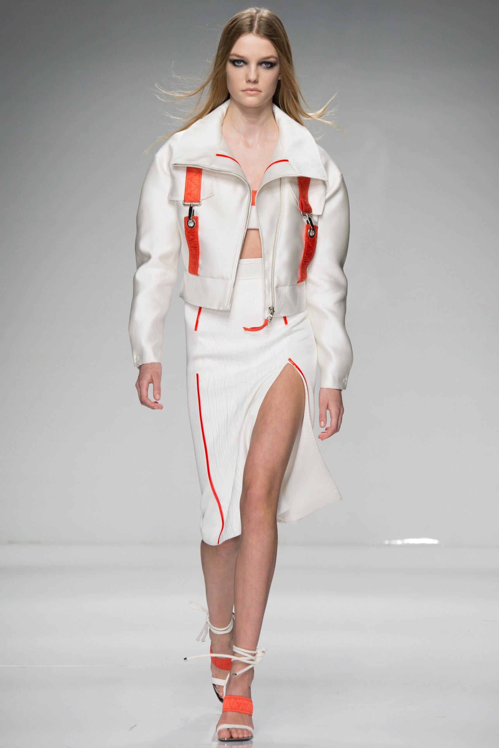 white leather fitted jacket and midi skirt