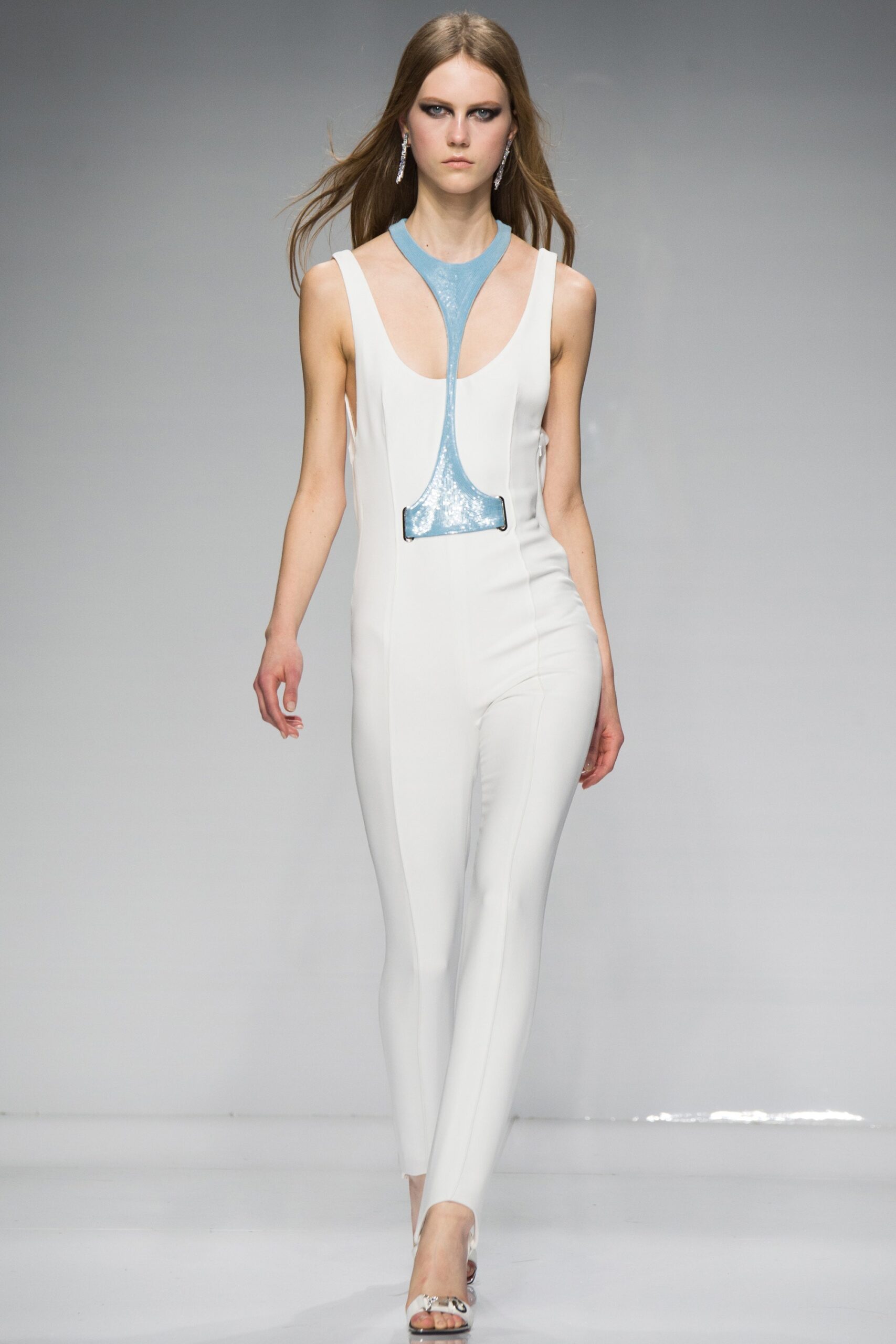 white fitted sleeveless catsuit
