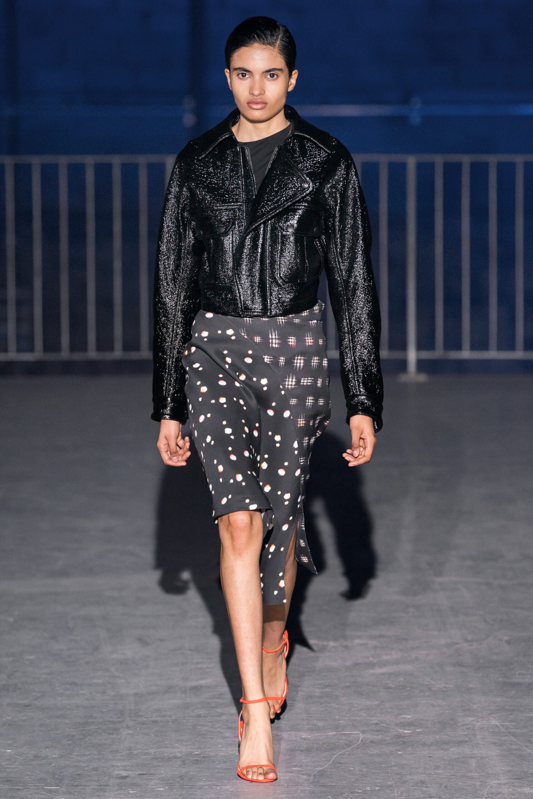 black leather fitted jacket and midi skirt
