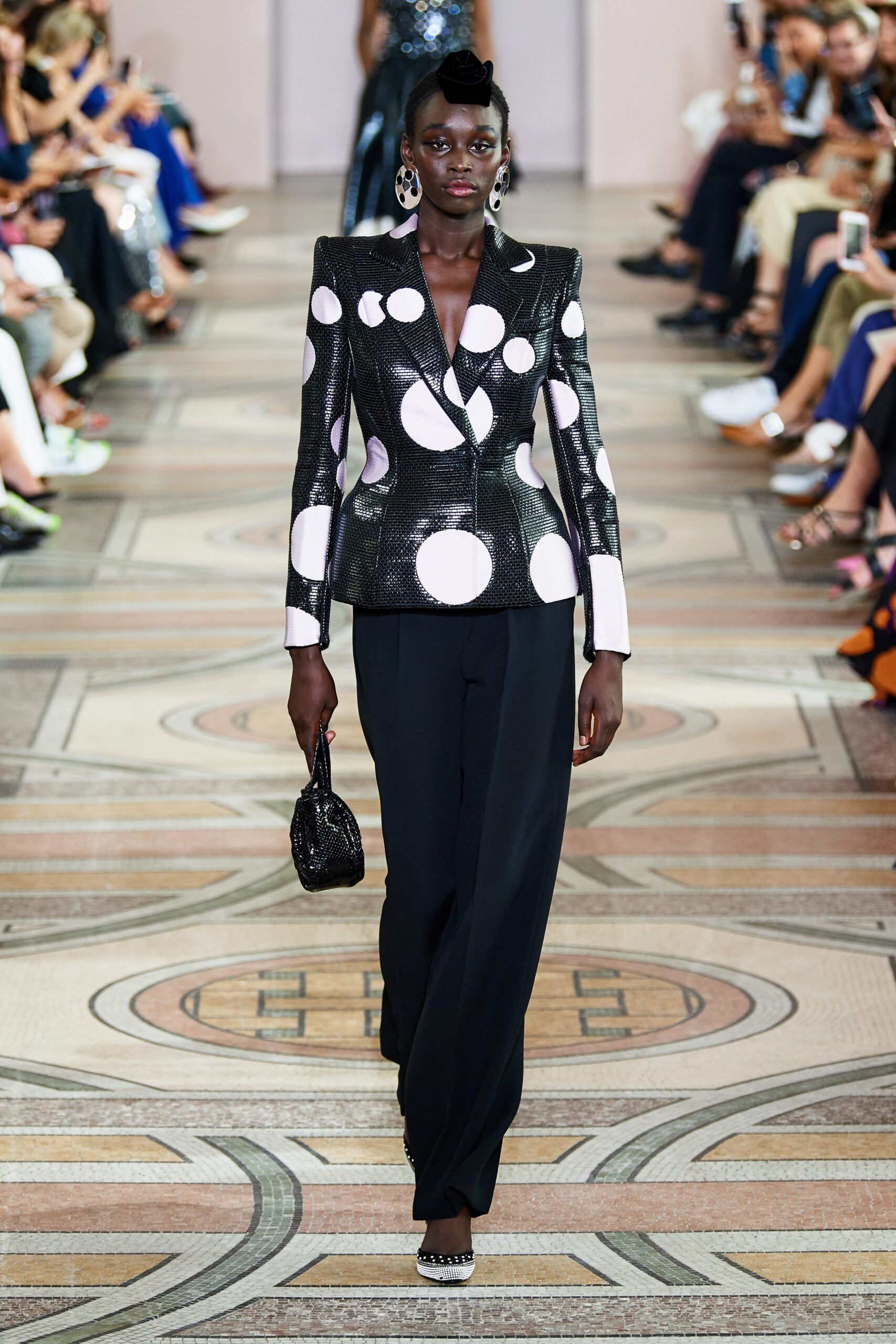 black and white polka-dot blazer with relaxed pants