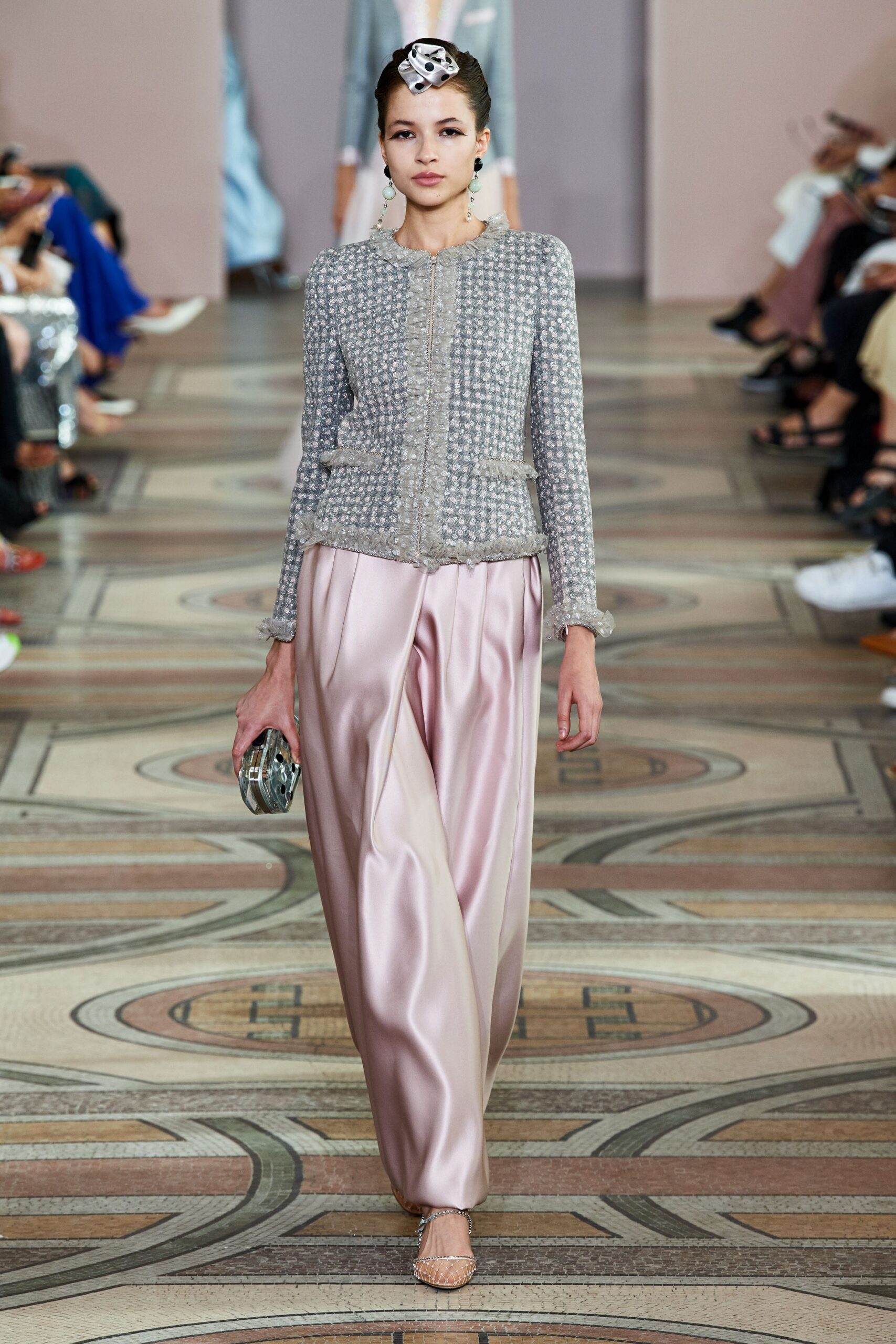 gray silk fitted jacket and pink pants