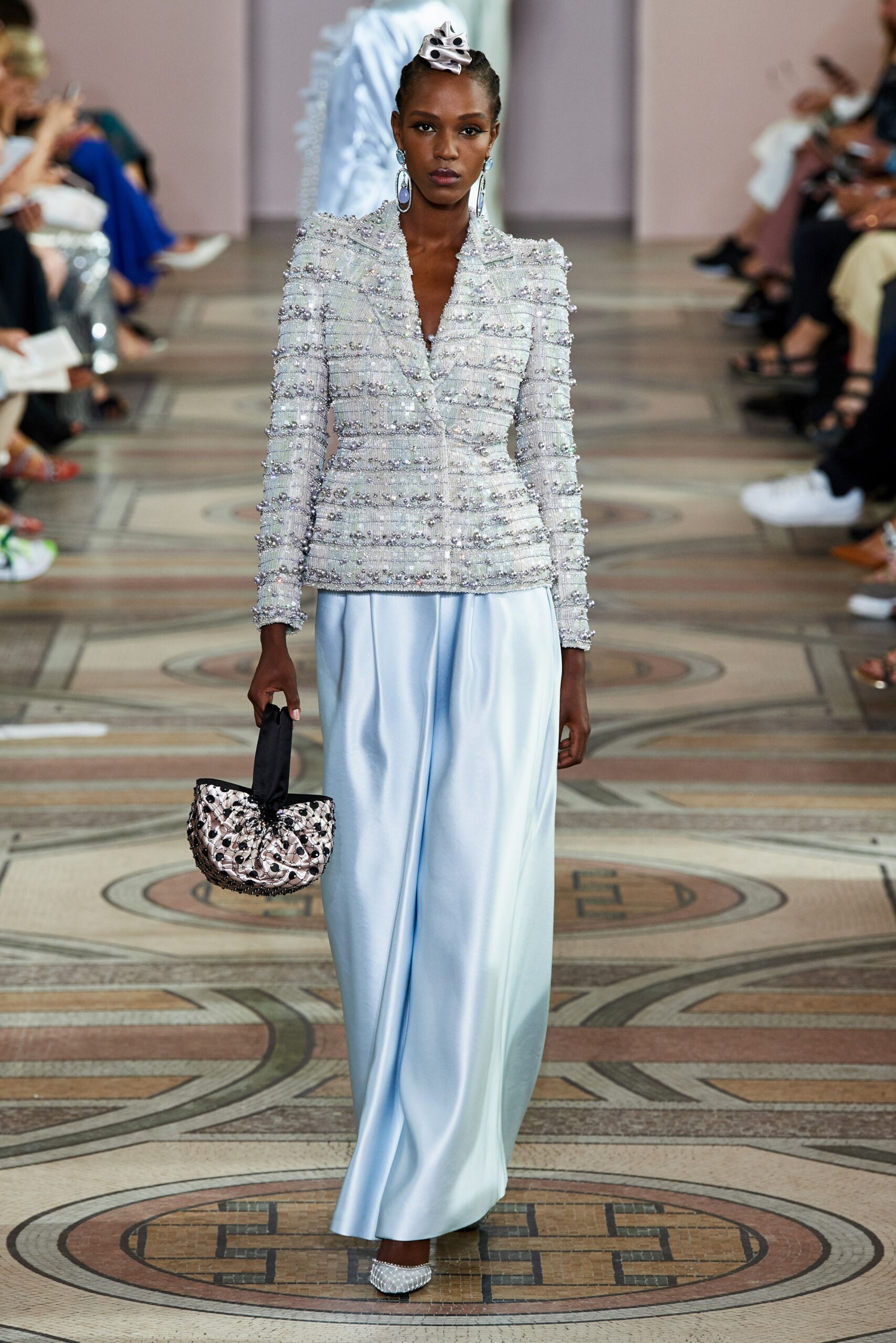 blue embroidered blazer with pleated skirt